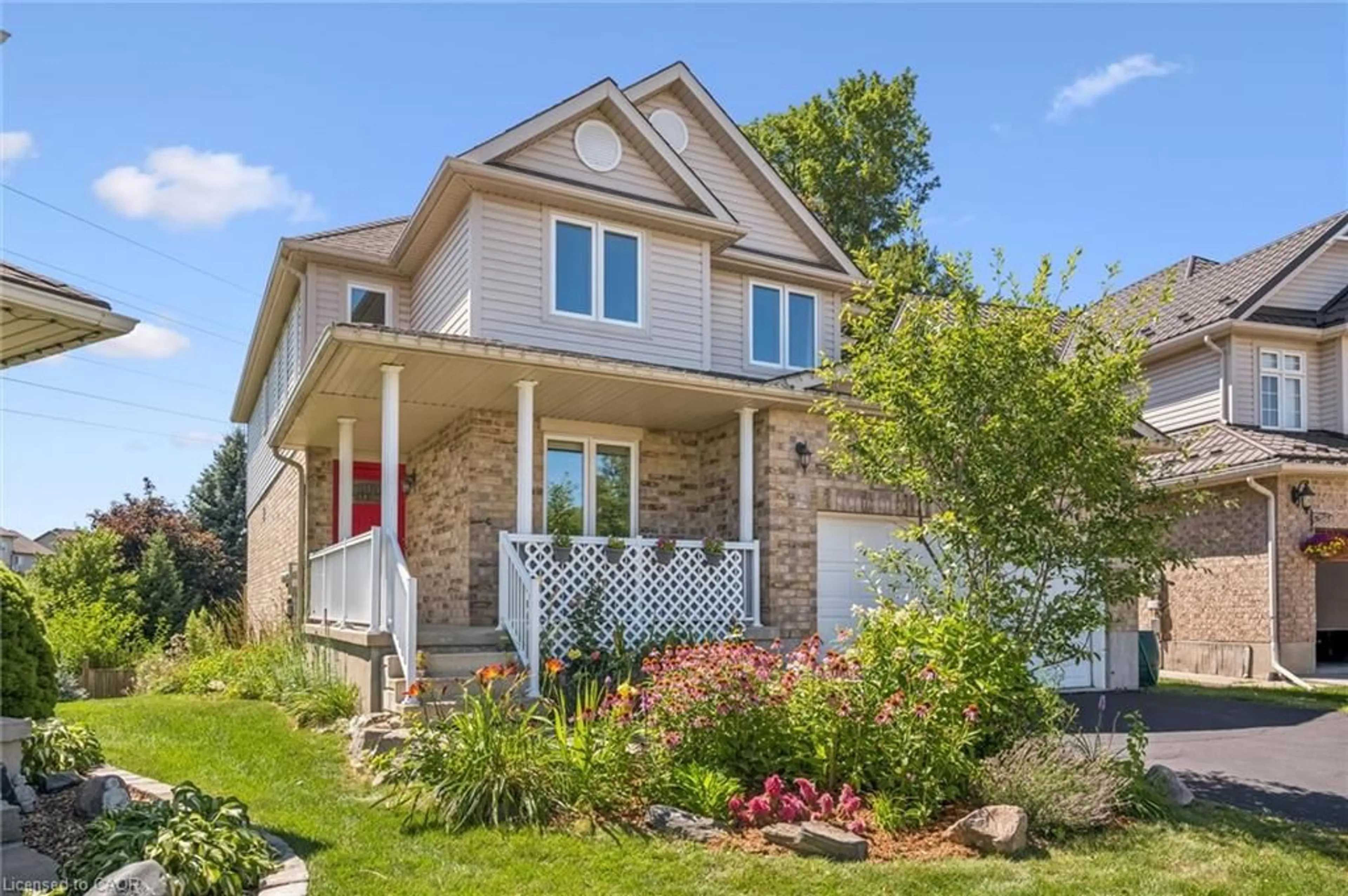 Home with brick exterior material, street for 56 Henhoeffer Cres, Kitchener Ontario N2E 4H4