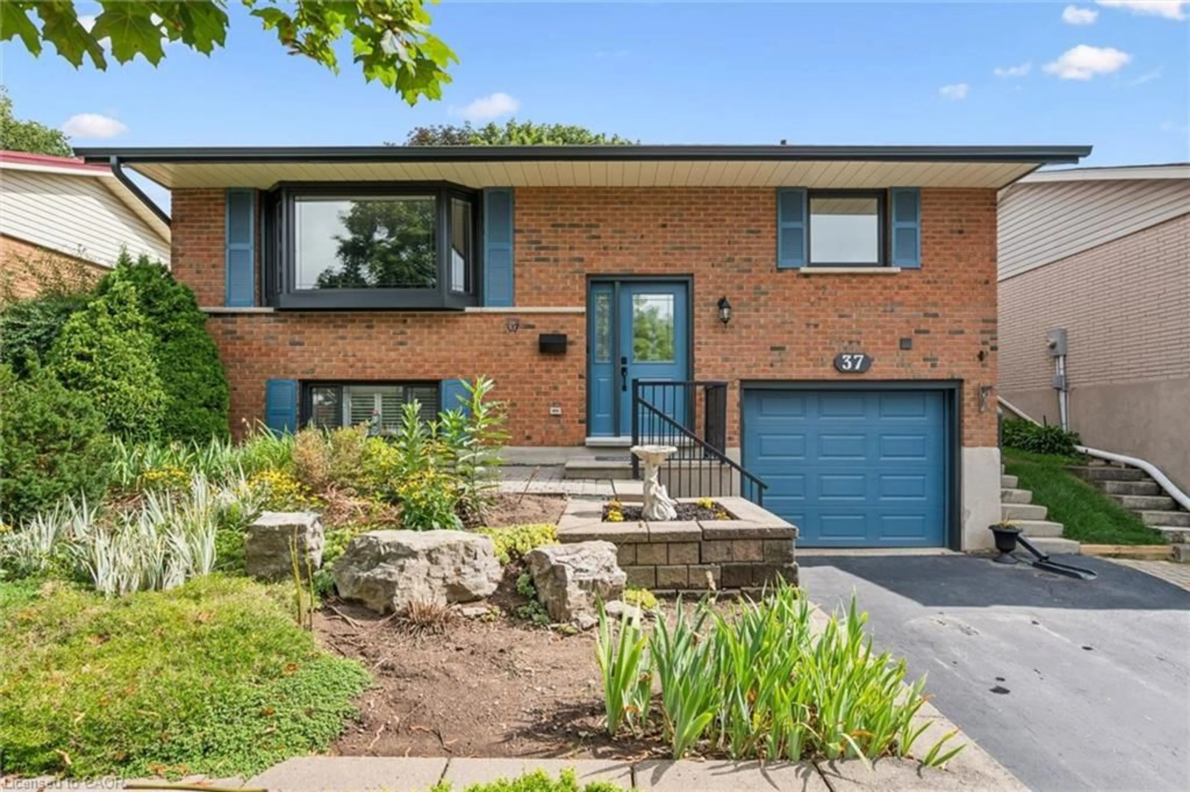 Home with brick exterior material, street for 37 Dunsmere Dr, Kitchener Ontario N2E 1V5