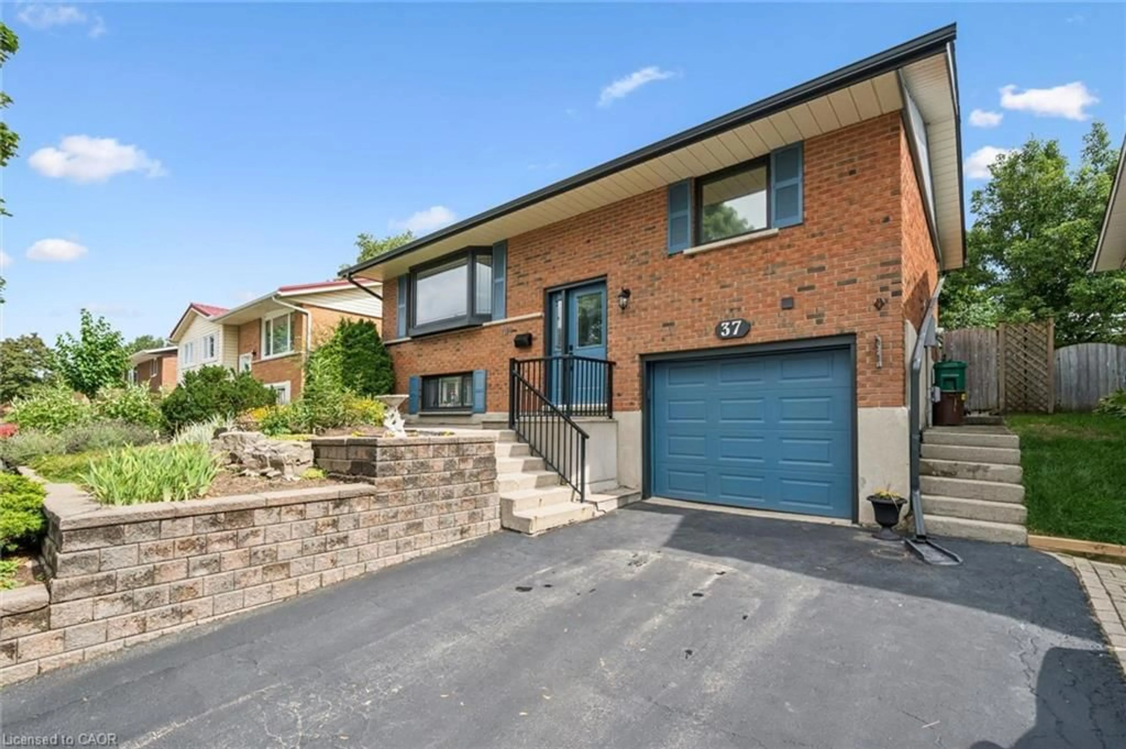 Home with brick exterior material, street for 37 Dunsmere Dr, Kitchener Ontario N2E 1V5