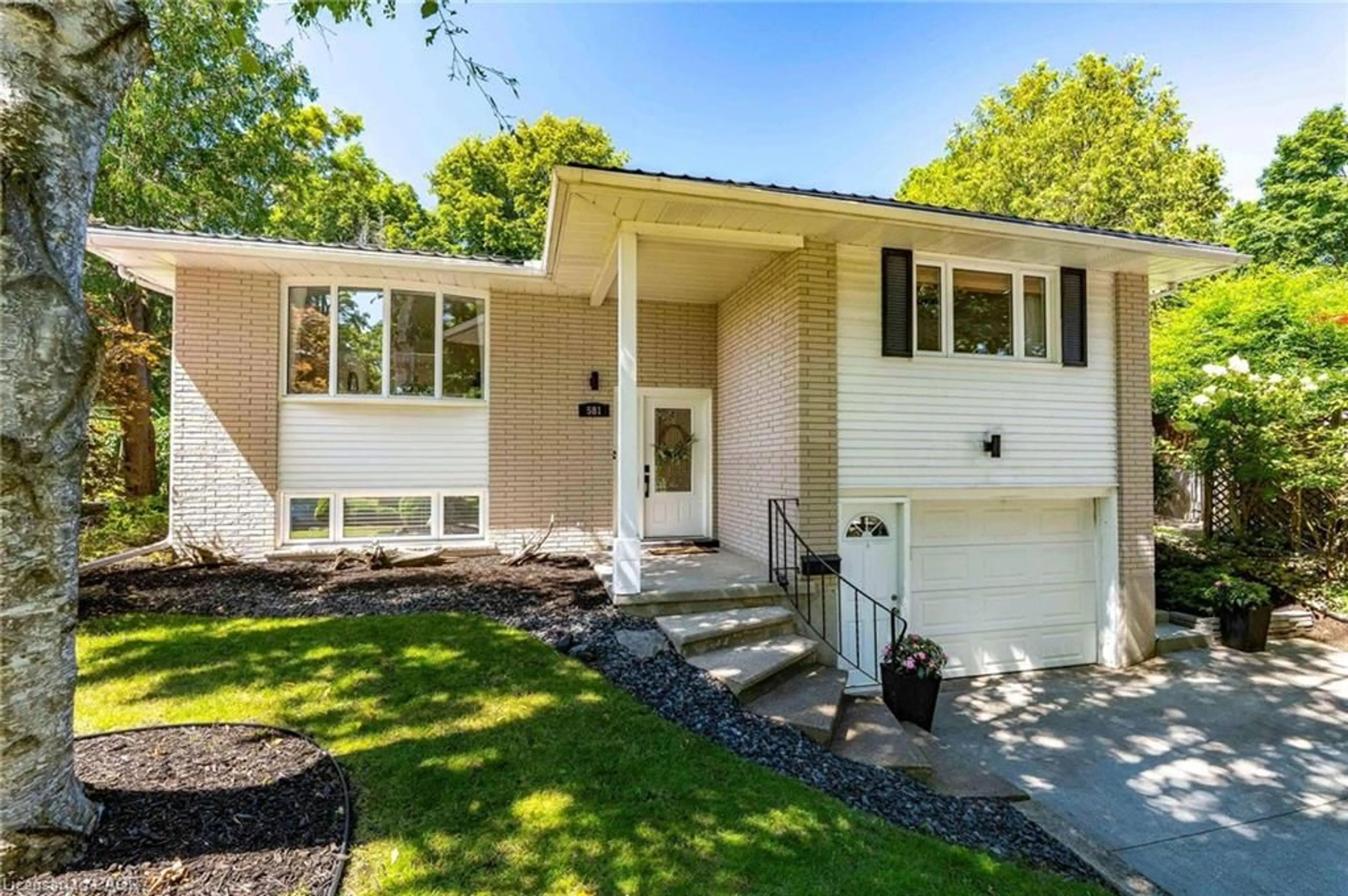 Home with vinyl exterior material, street for 581 Glendene Cres, Waterloo Ontario N2L 4P3
