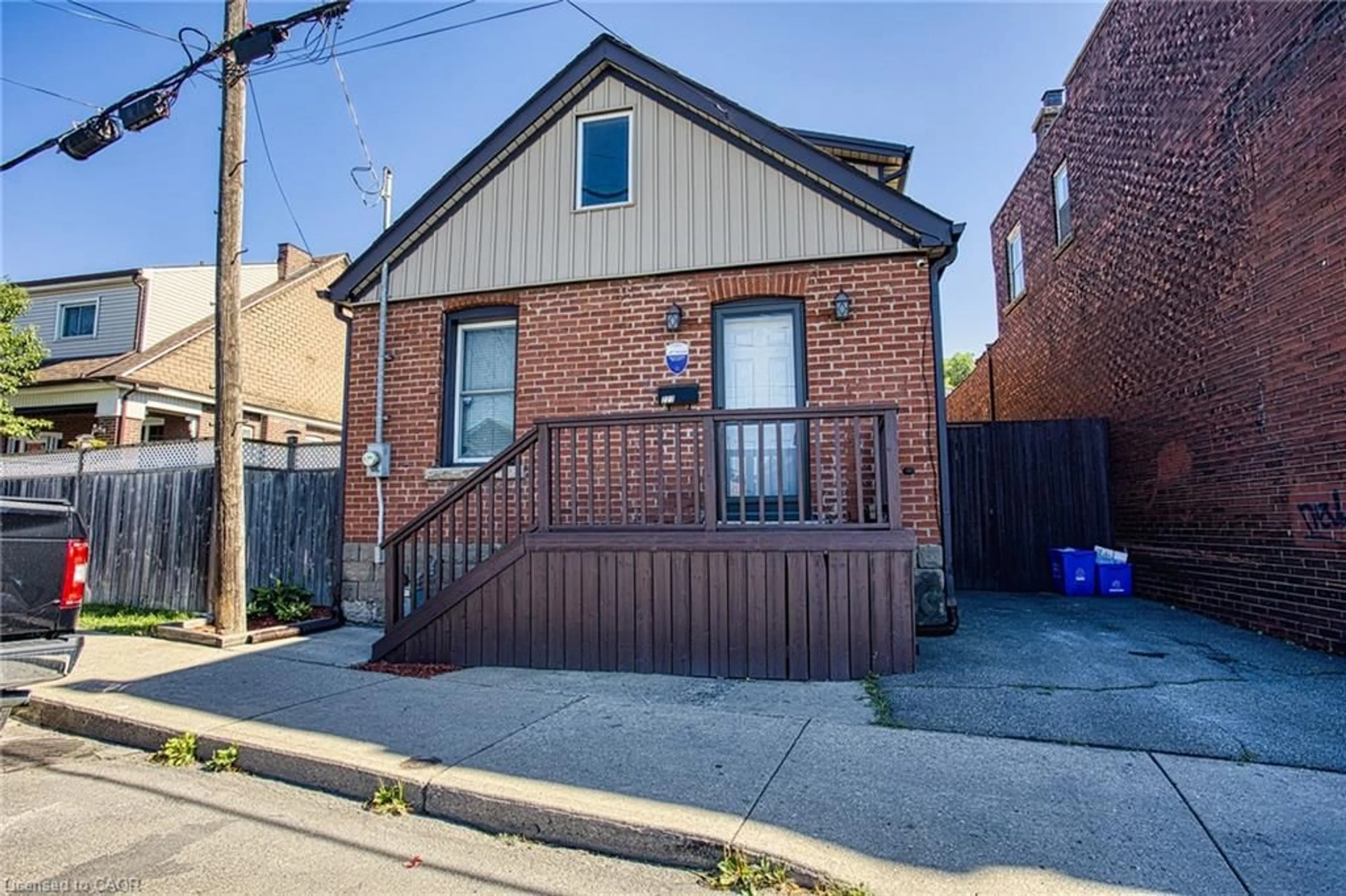 Home with brick exterior material, street for 227 Beach Rd, Hamilton Ontario L8L 4A9