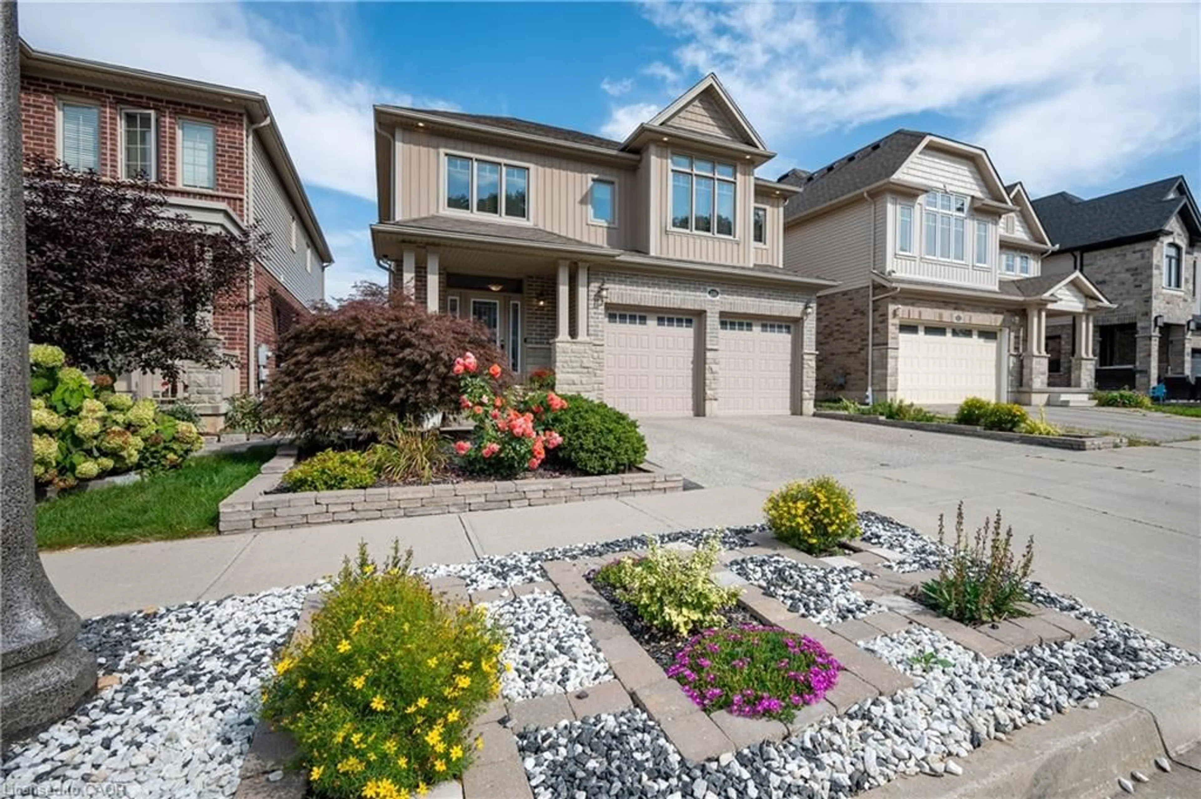 Home with brick exterior material, street for 299 Moorlands Cres, Kitchener Ontario N2P 0C4