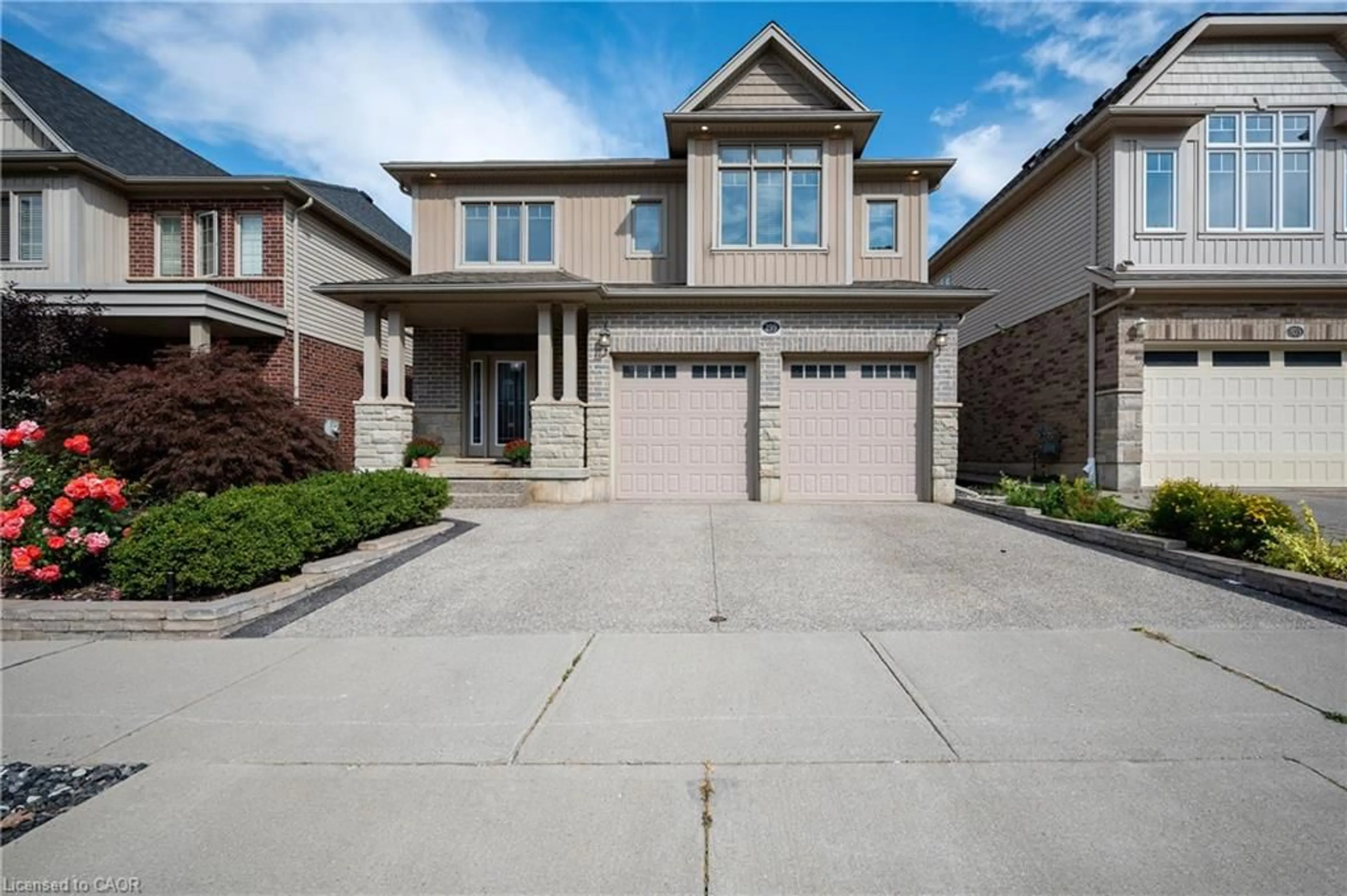Home with brick exterior material, street for 299 Moorlands Cres, Kitchener Ontario N2P 0C4