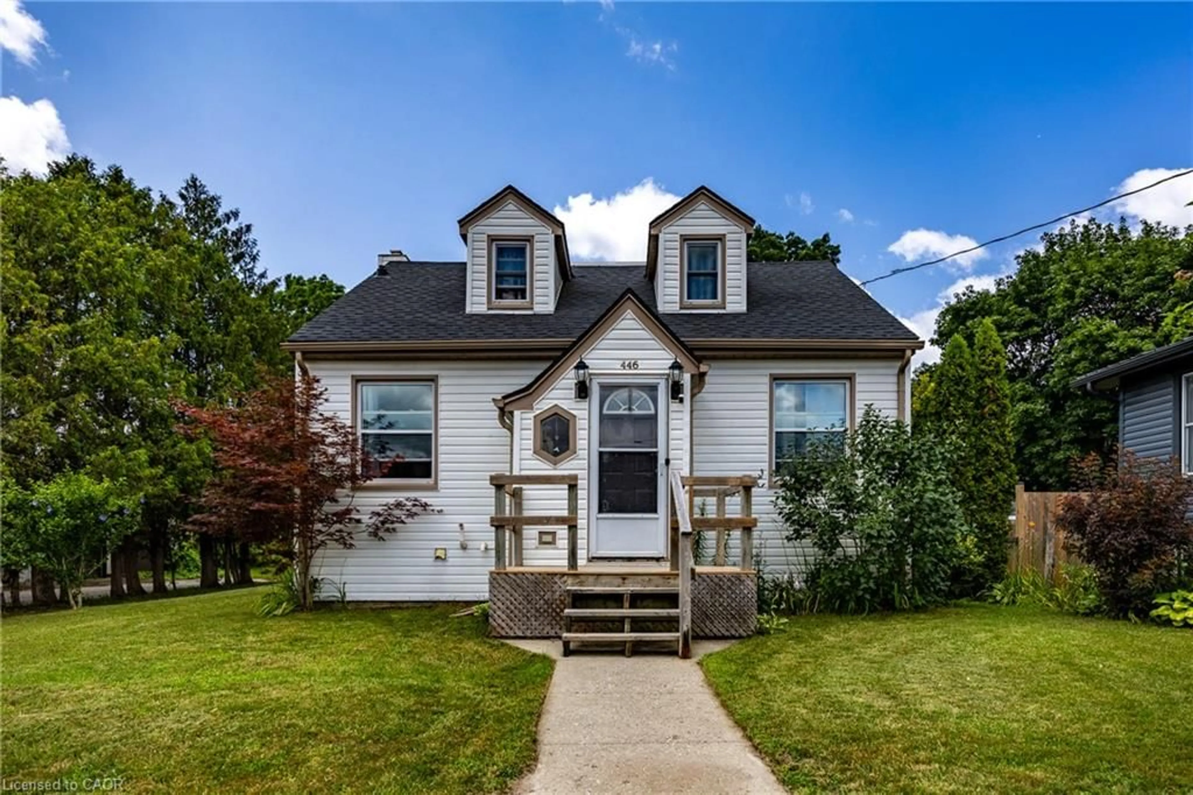 Home with vinyl exterior material, street for 446 East St, Delhi Ontario N4B 2J3