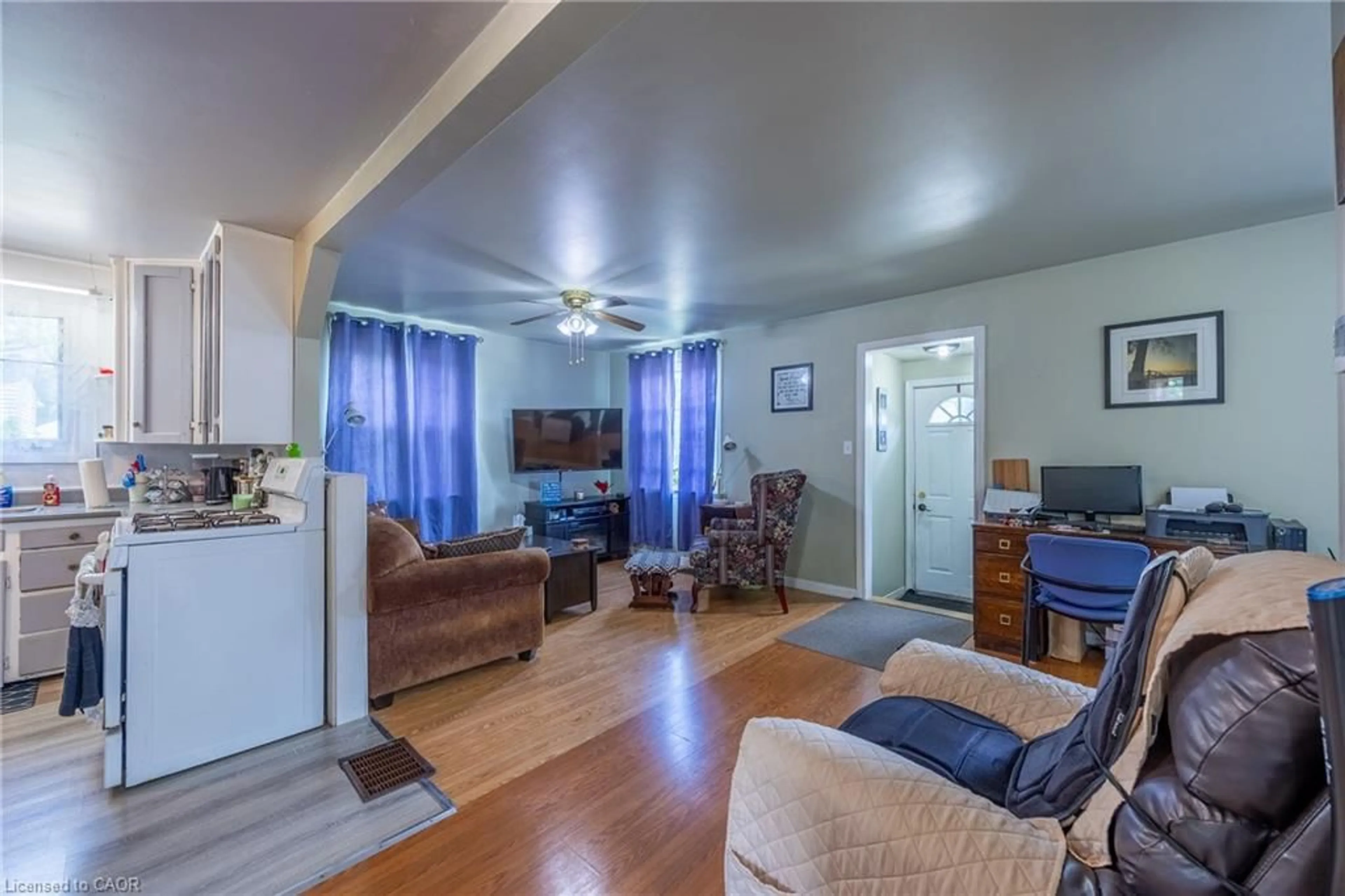Living room with furniture, wood/laminate floor for 446 East St, Delhi Ontario N4B 2J3
