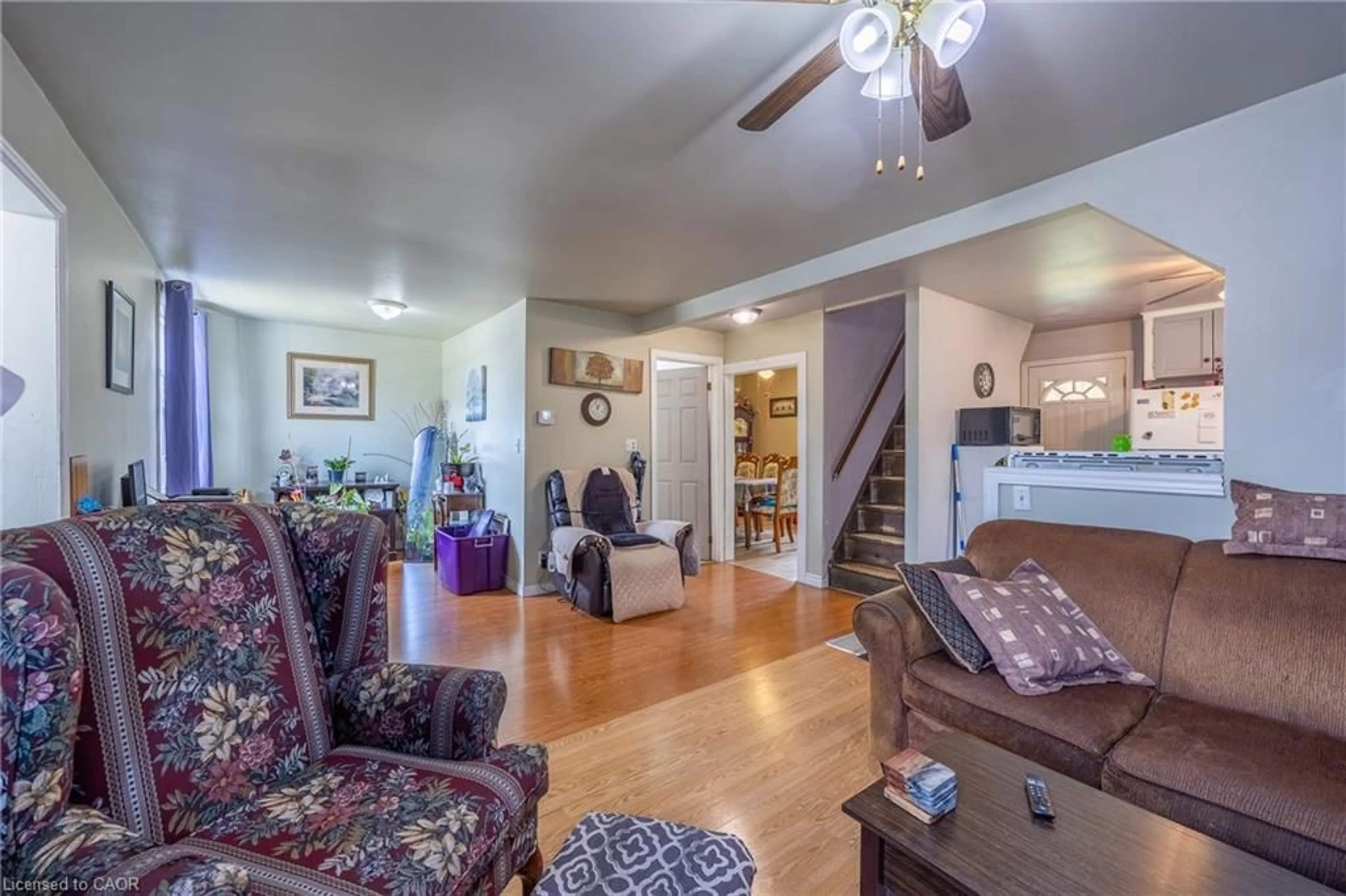 Living room with furniture, wood/laminate floor for 446 East St, Delhi Ontario N4B 2J3