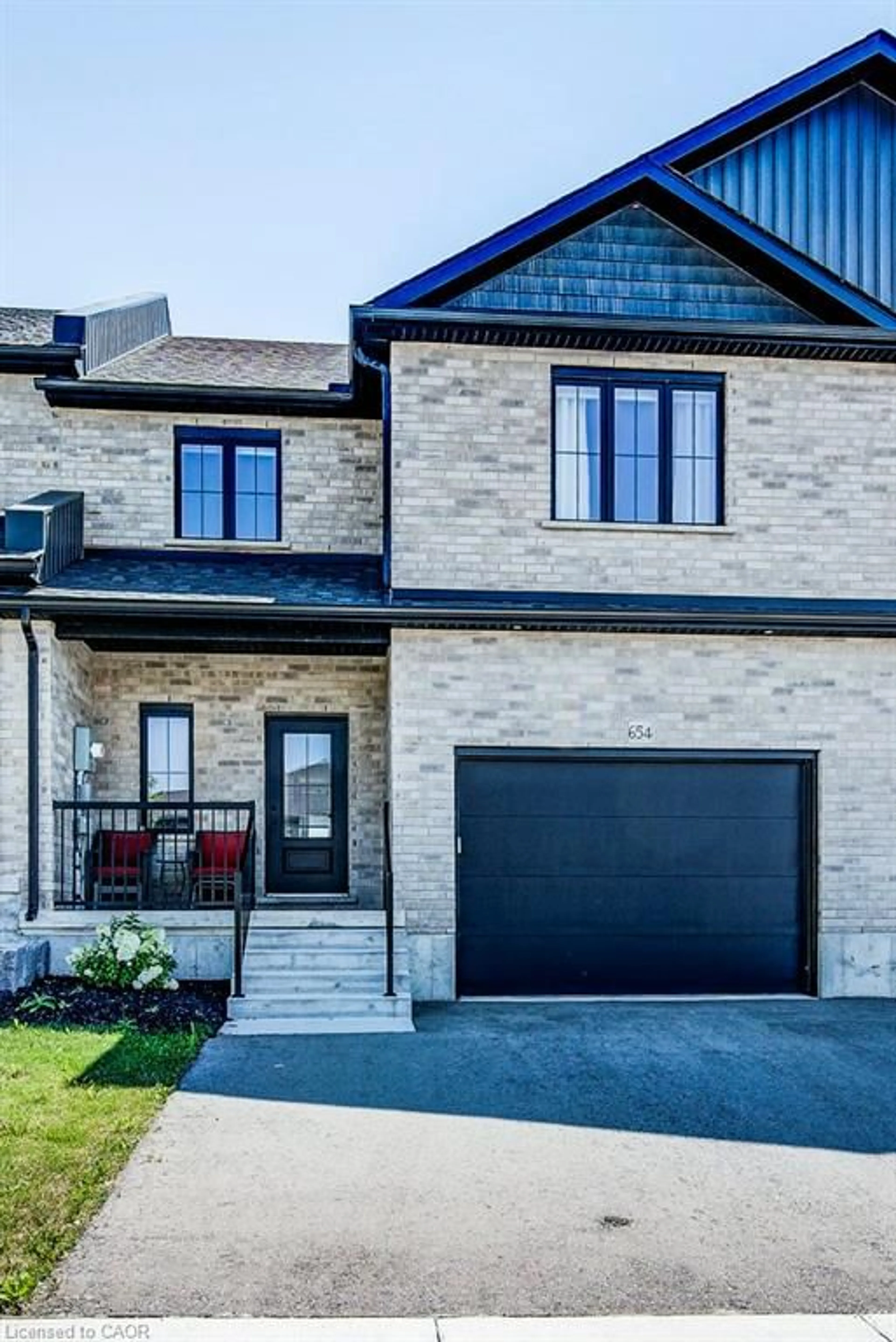 Home with brick exterior material, street for 654 Wray Ave, Listowel Ontario N4W 3K9