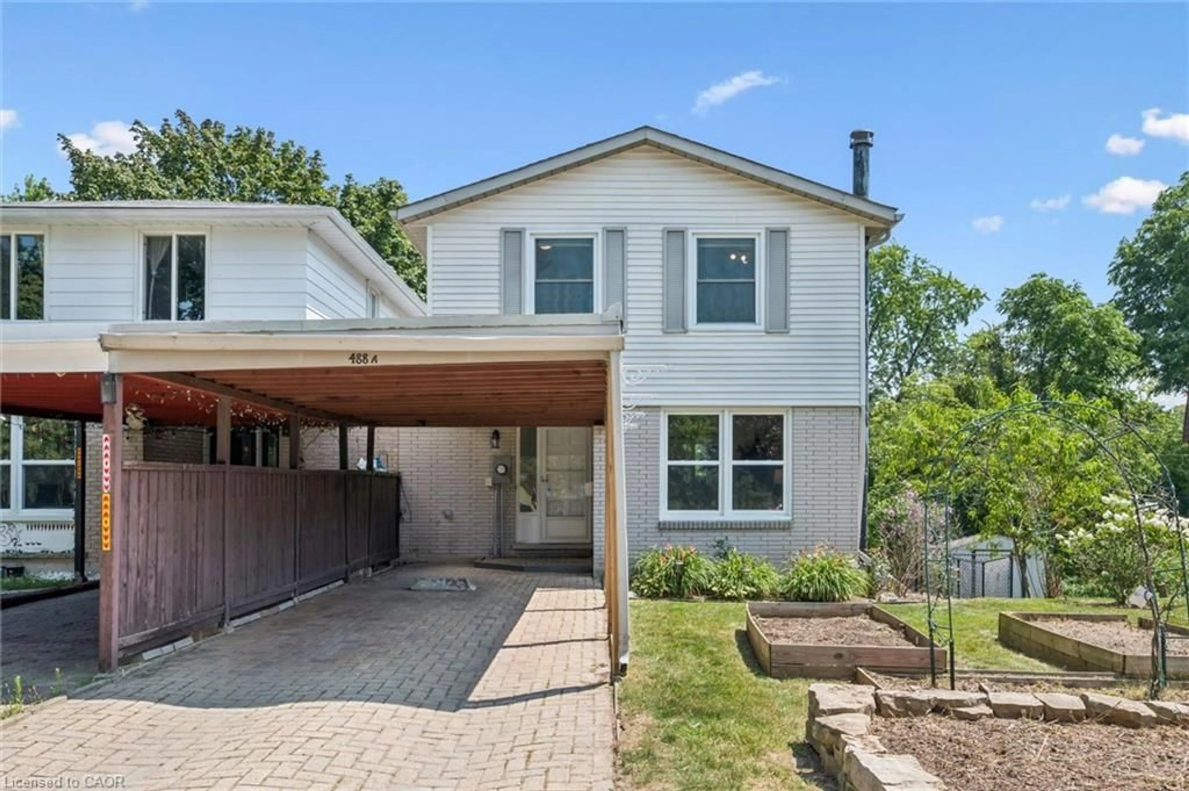 Home with brick exterior material, street for 488 Glenelm Cres #A, Waterloo Ontario N2L 5C8