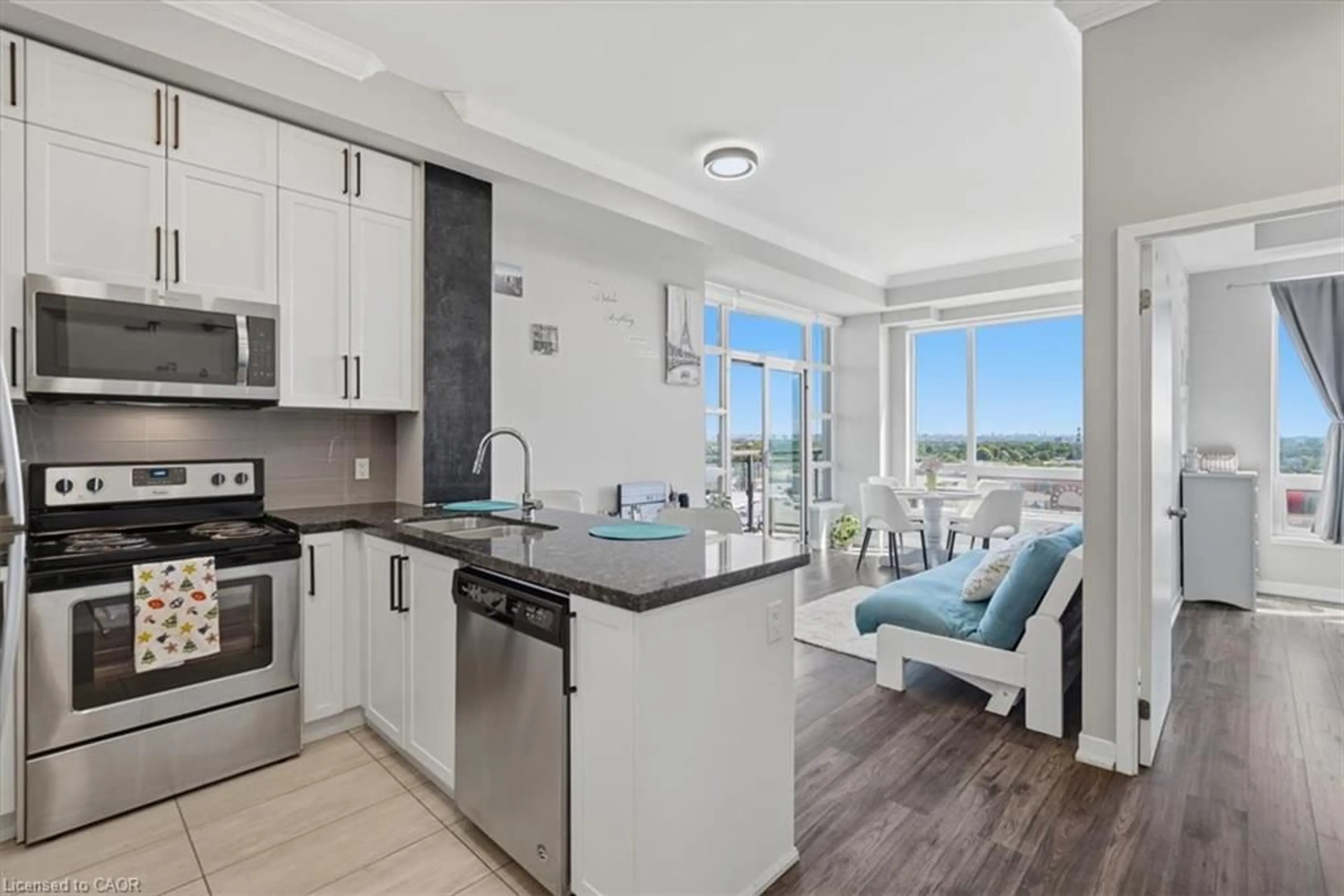 Open concept kitchen, unknown for 840 Queens Plate Dr #1009, Toronto Ontario M9W 7J9