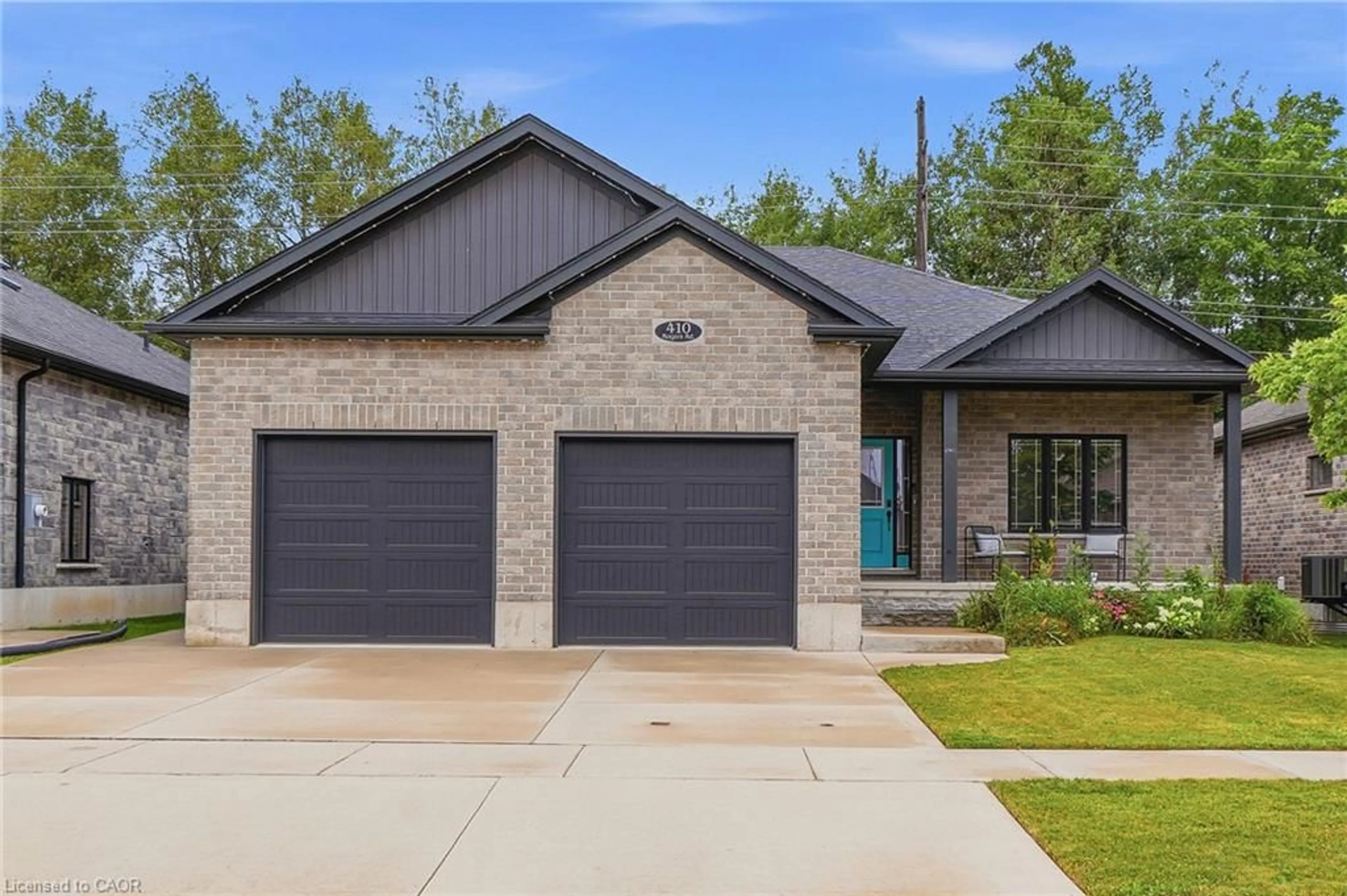 Home with brick exterior material, street for 410 Rogers Rd, Listowel Ontario N4W 0H2