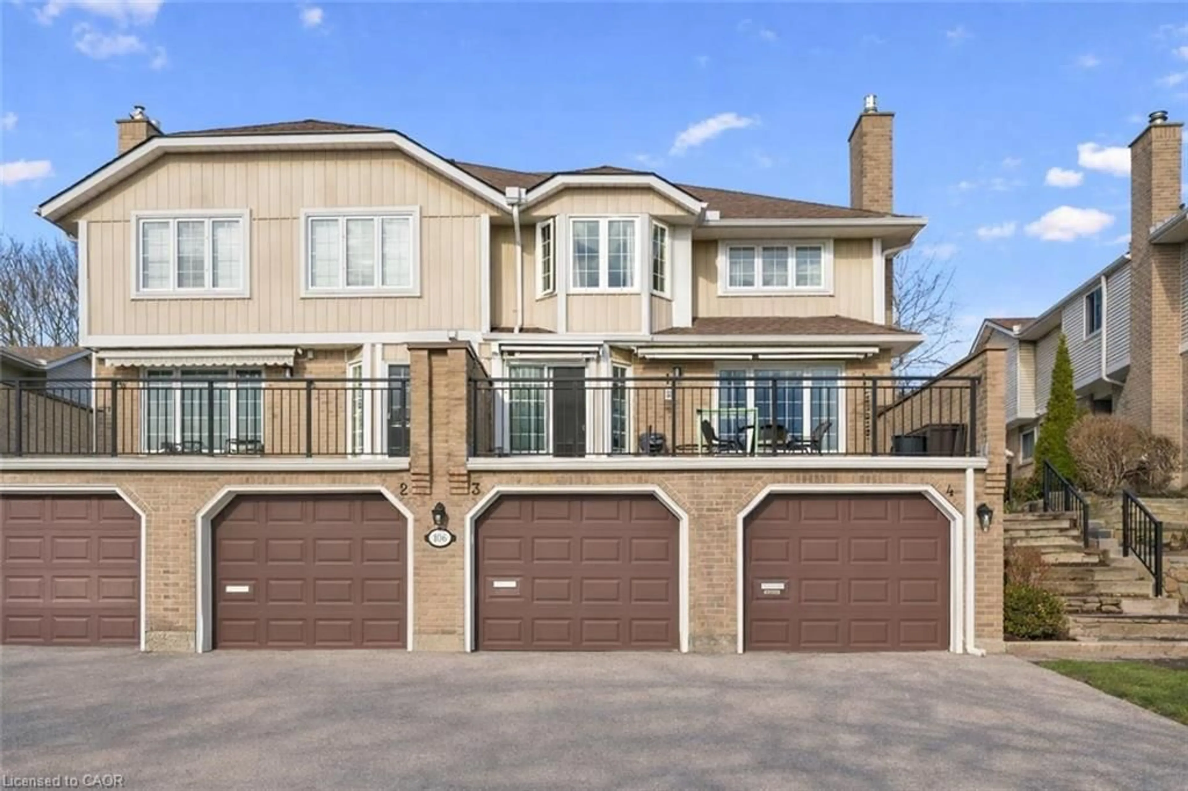Home with brick exterior material, street for 106 Woodlawn Rd #3, Guelph Ontario N1E 1B7