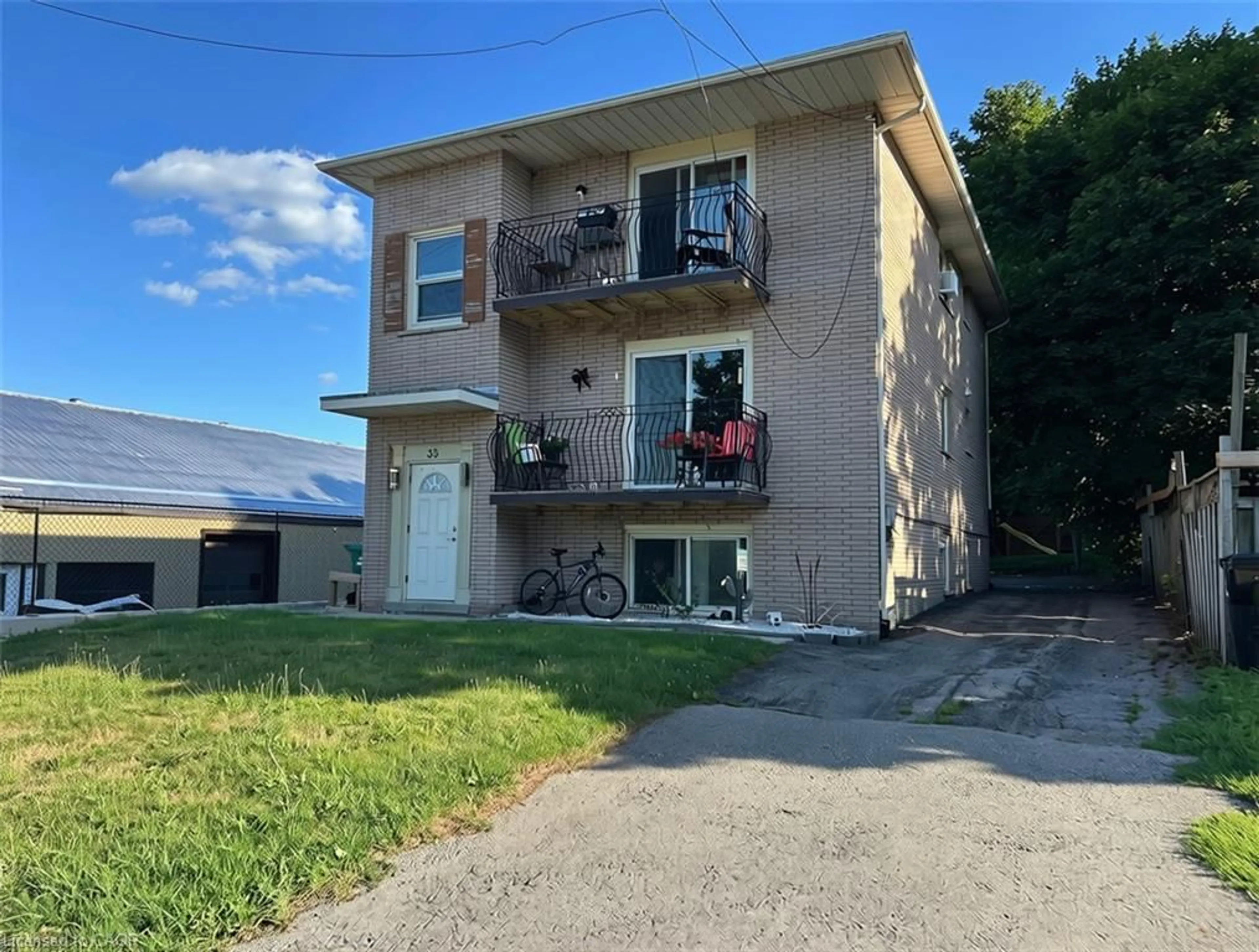 A pic from outside/outdoor area/front of a property/back of a property/a pic from drone, street for 35 Mill St, Elmira Ontario N3B 2K5