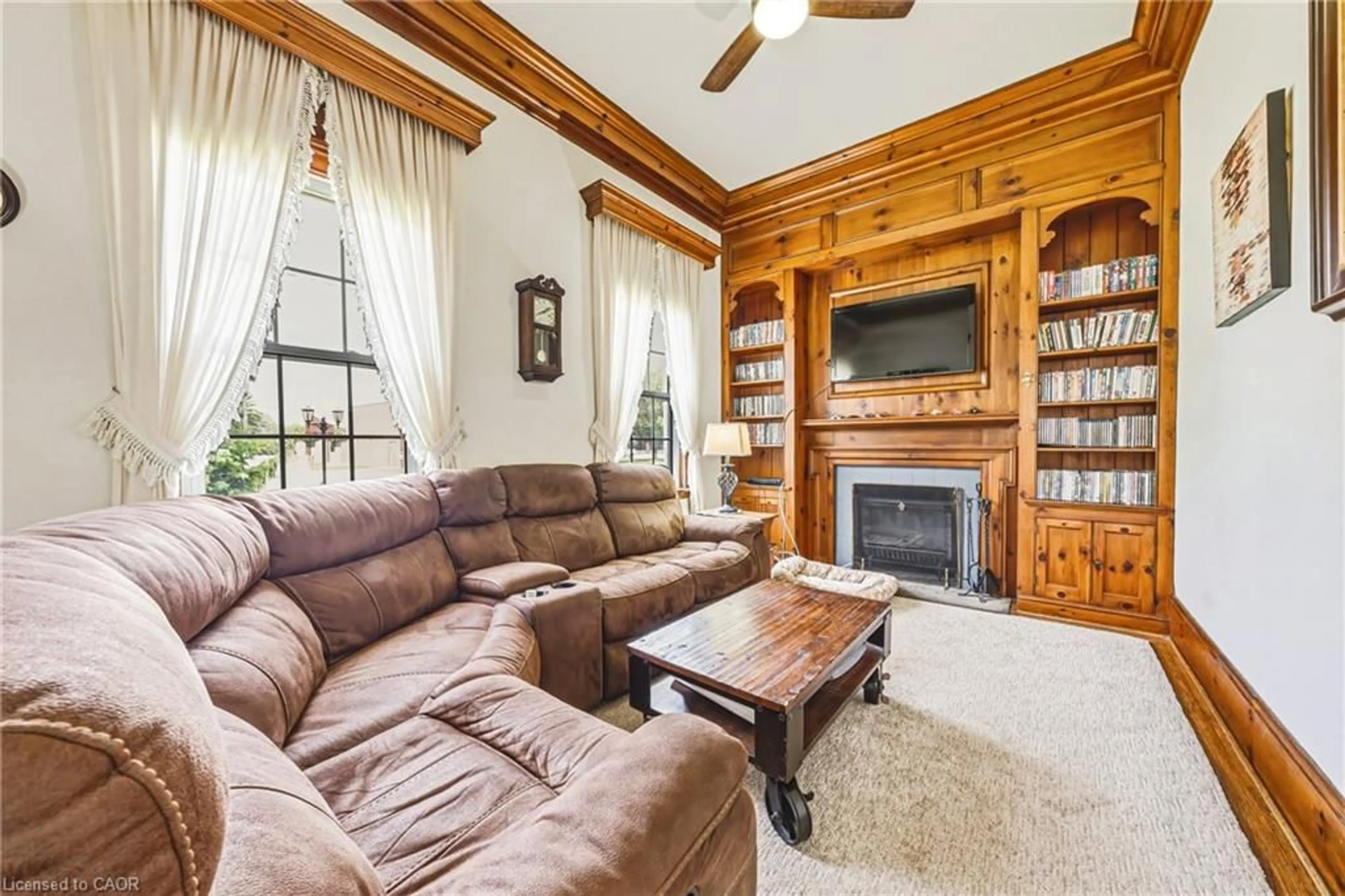 Living room with furniture, wood/laminate floor for 670 Mount Pleasant Rd, Mount Pleasant Ontario N0E 1K0
