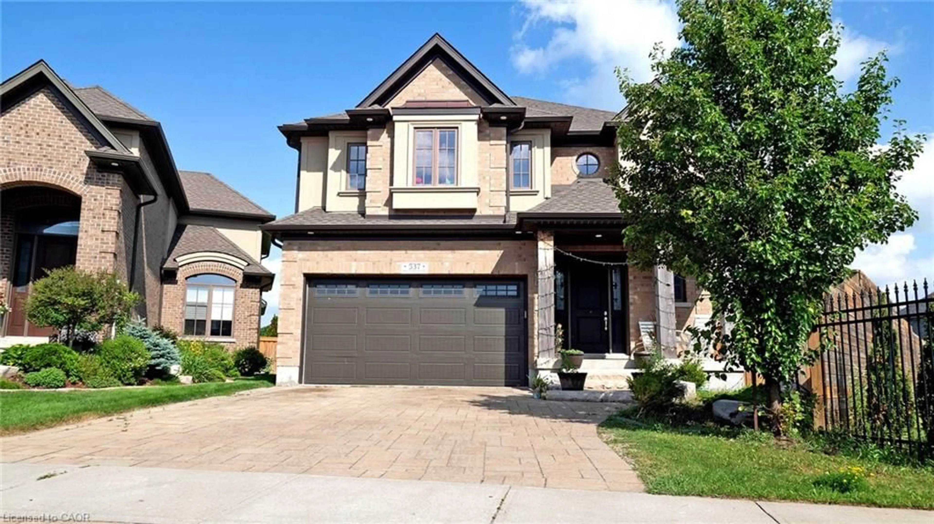 Home with brick exterior material, street for 537 Millstream Dr, Waterloo Ontario N2K 0E2