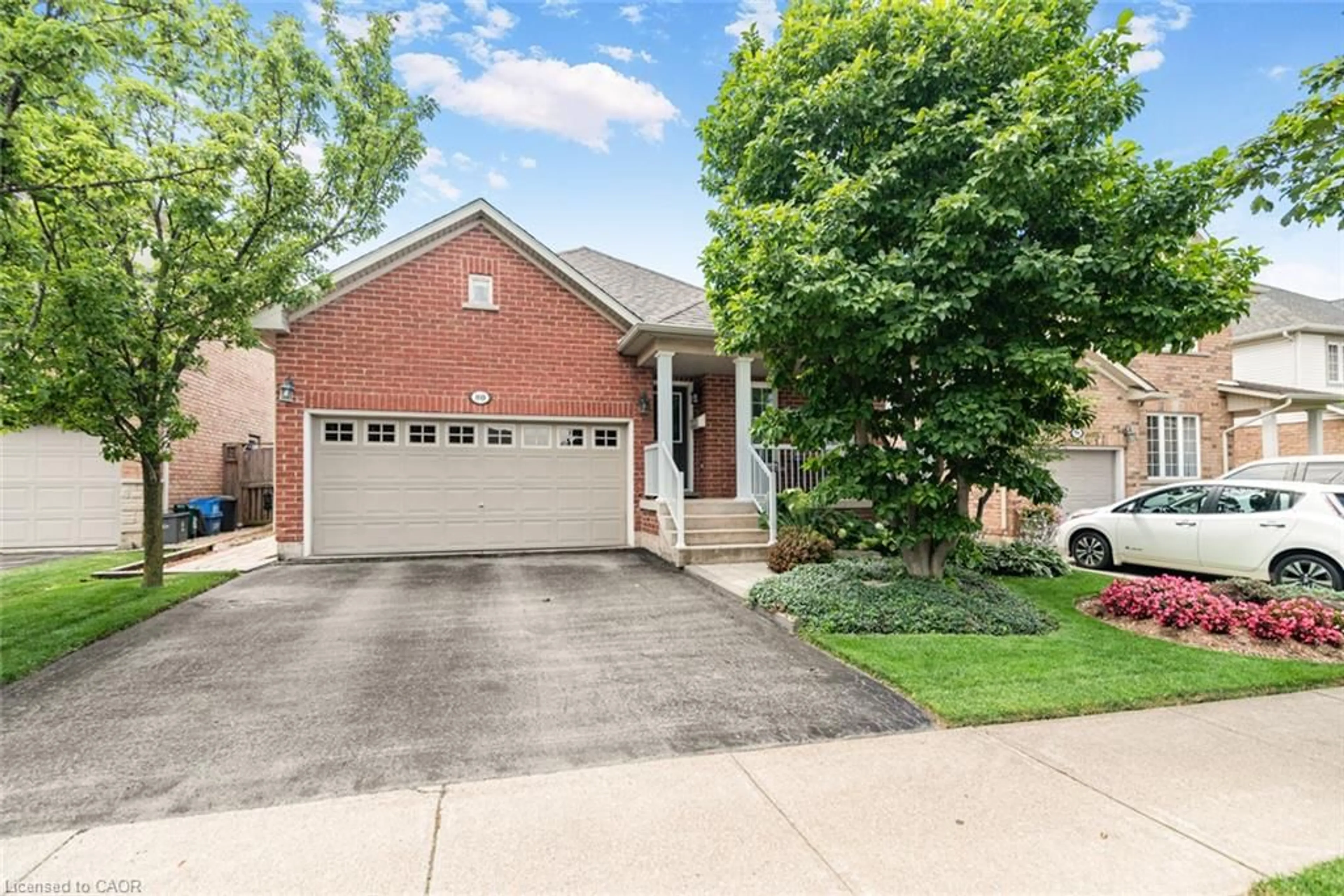 Home with brick exterior material, street for 80 Vinifera Dr, Grimsby Ontario L3M 5S6