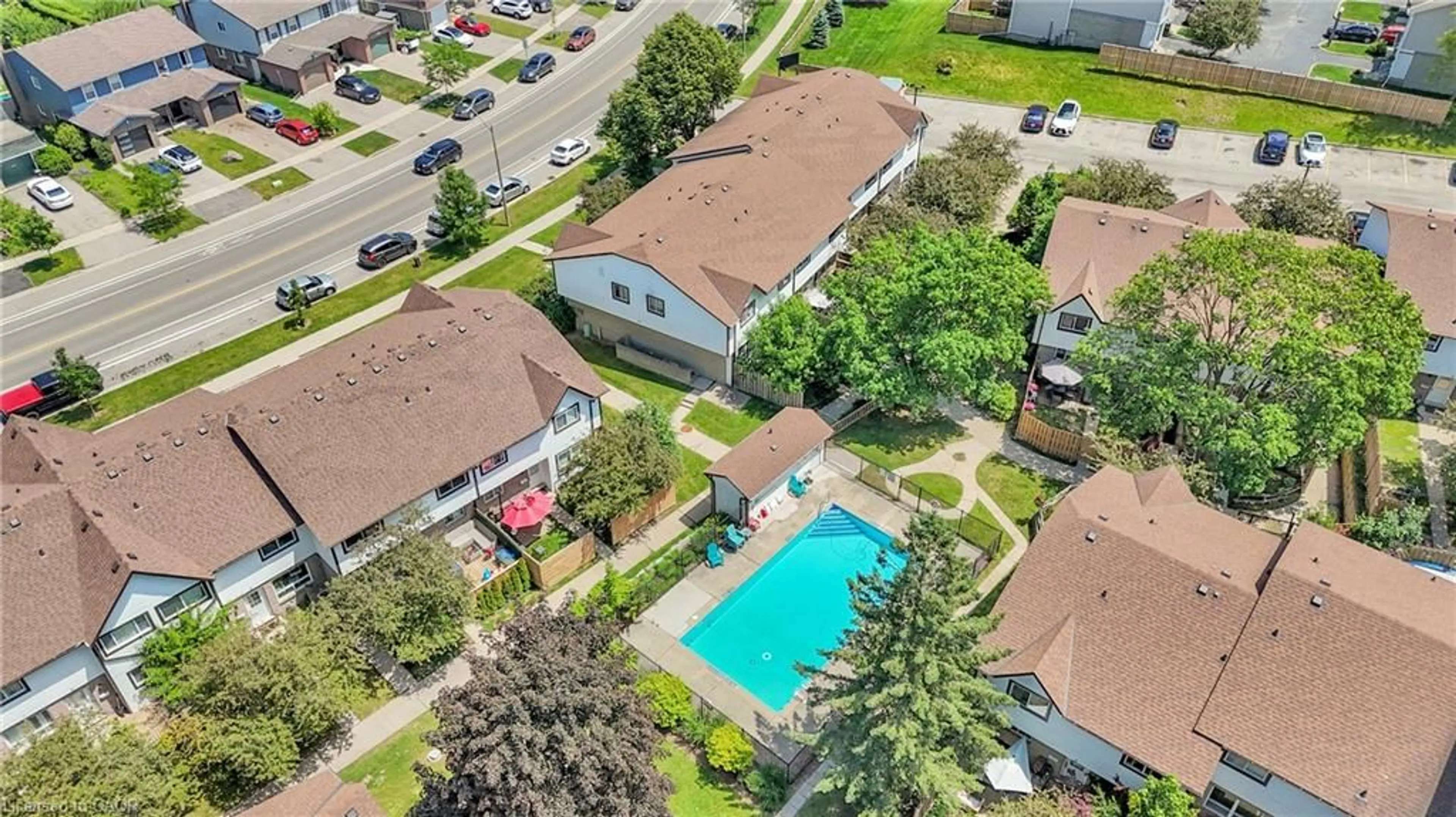 A pic from outside/outdoor area/front of a property/back of a property/a pic from drone, street for 375 Pioneer Dr #7, Kitchener Ontario N2P 1L8