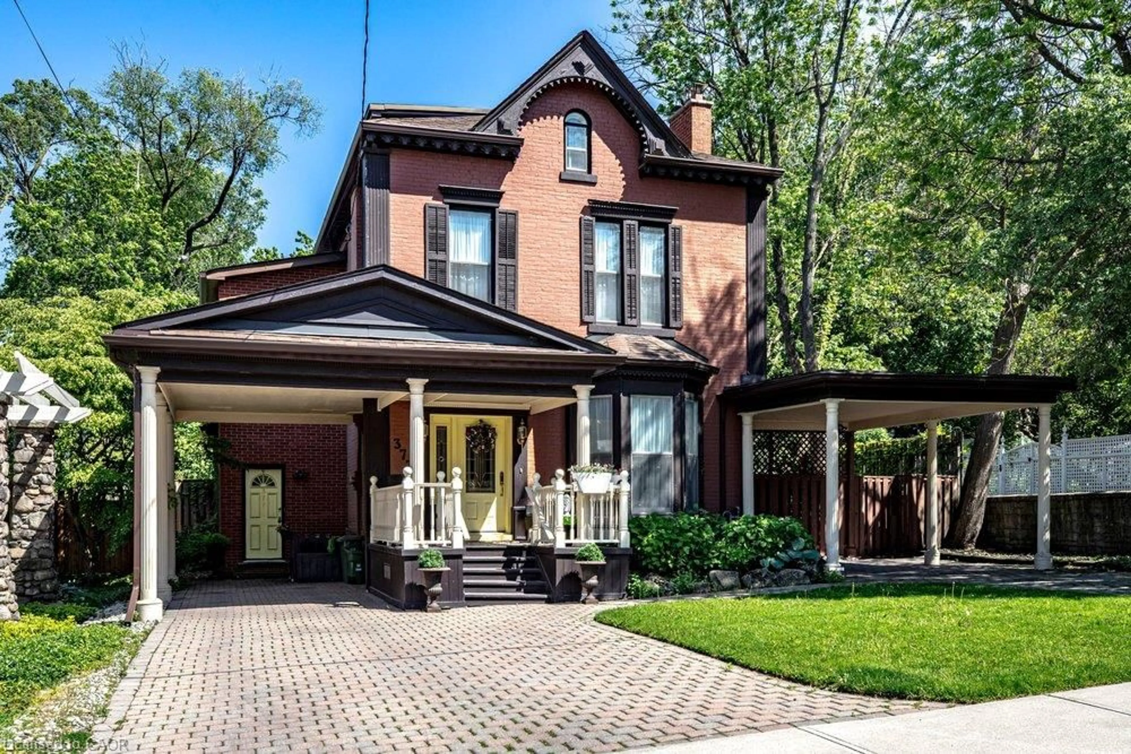 Home with brick exterior material, street for 377 Hess St, Hamilton Ontario L8P 3R2