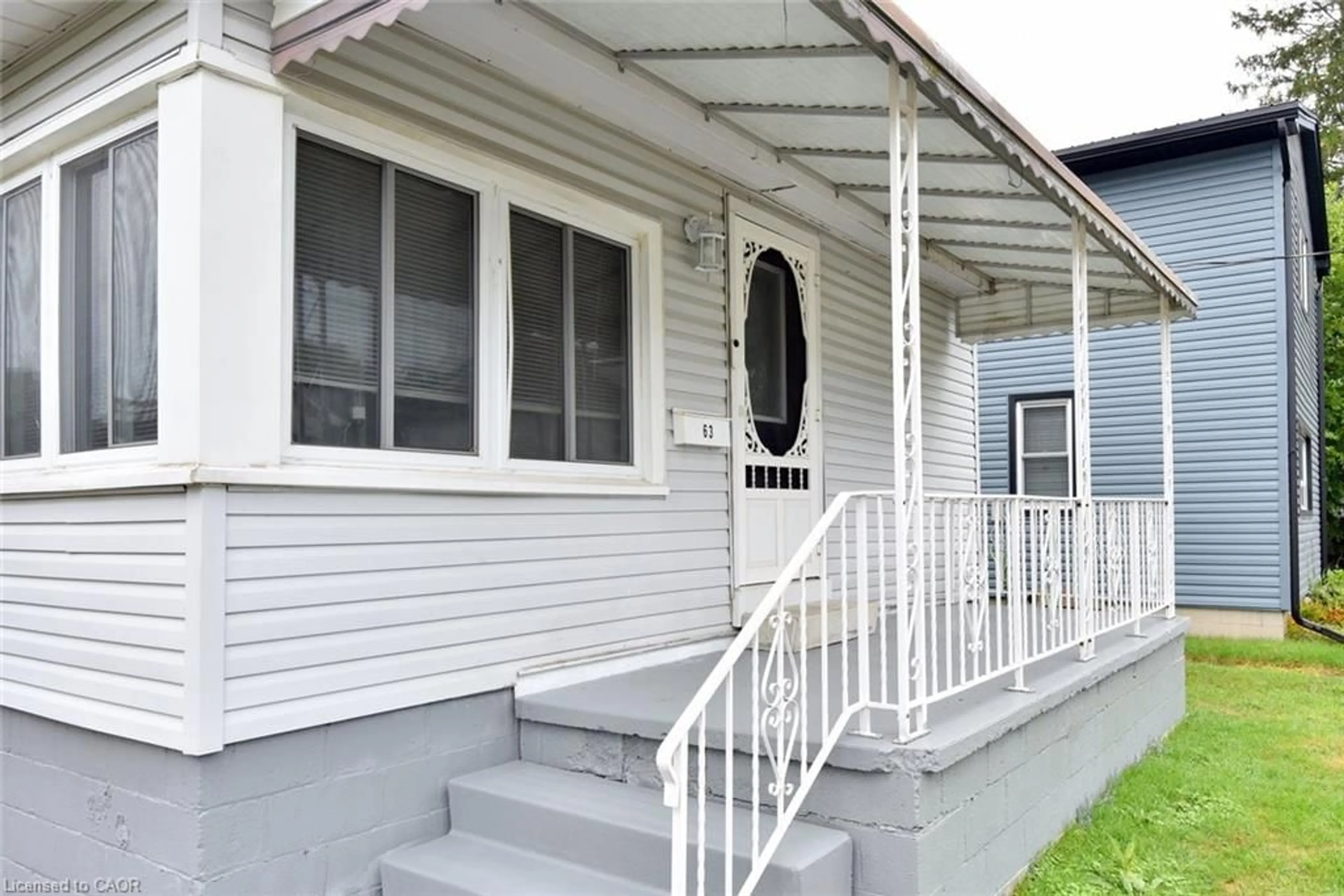 Home with vinyl exterior material, street for 63 Patterson St, Simcoe Ontario N3Y 1J4