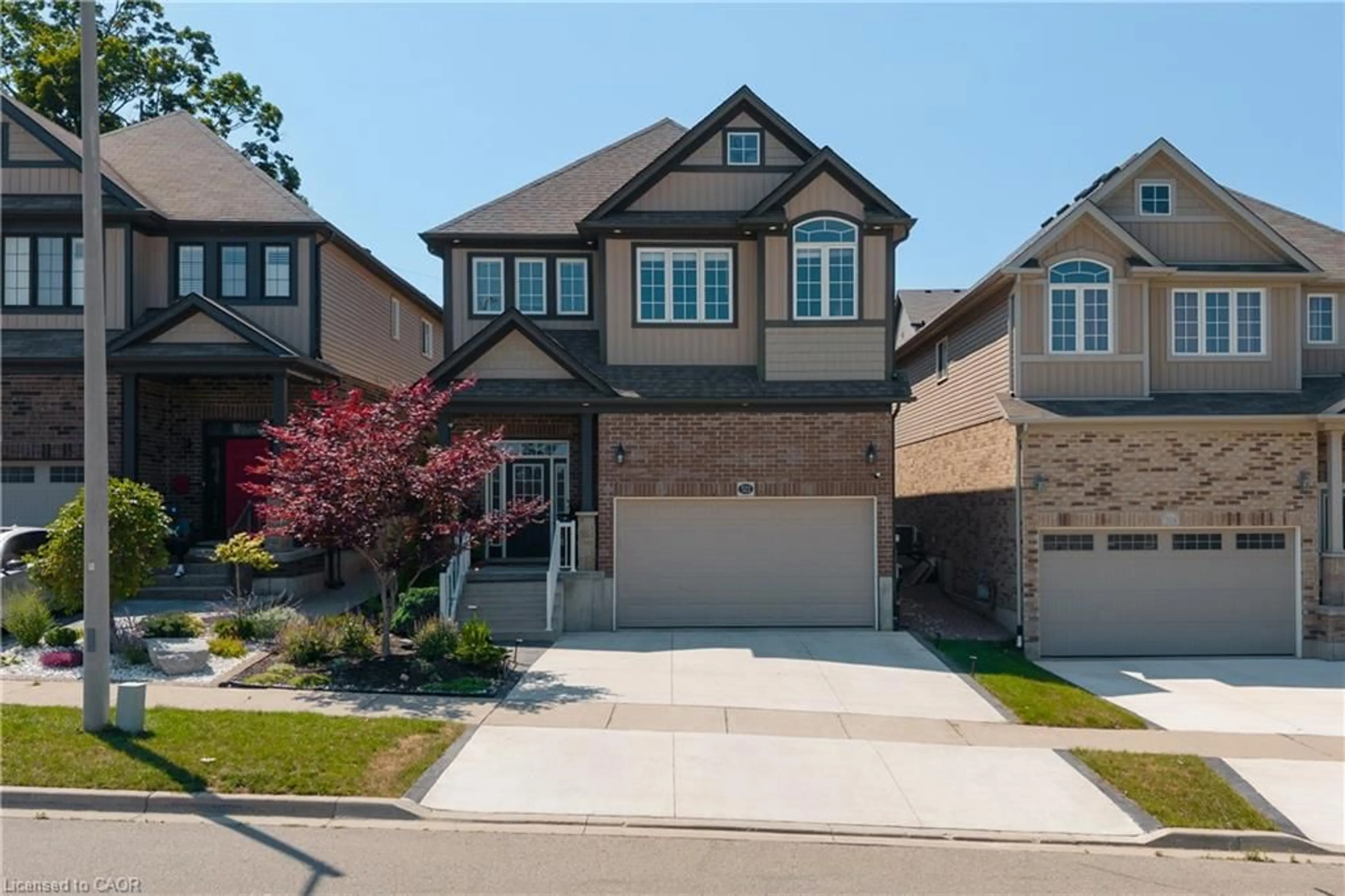Home with brick exterior material, street for 522 Woodbine Ave, Kitchener Ontario N2R 1Y9