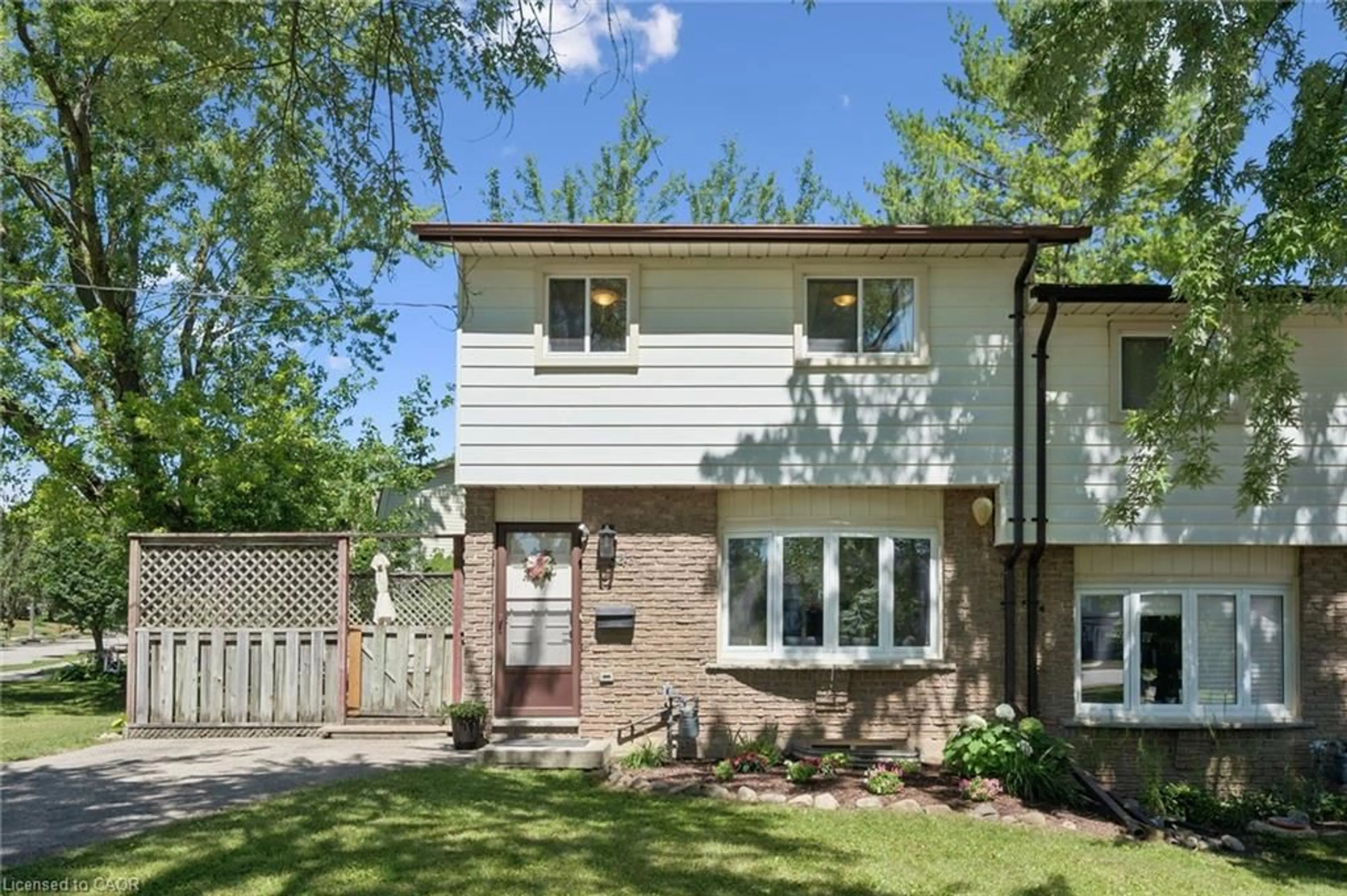 Home with brick exterior material, street for 54 Ellis Cres #A, Waterloo Ontario N2J 4L2