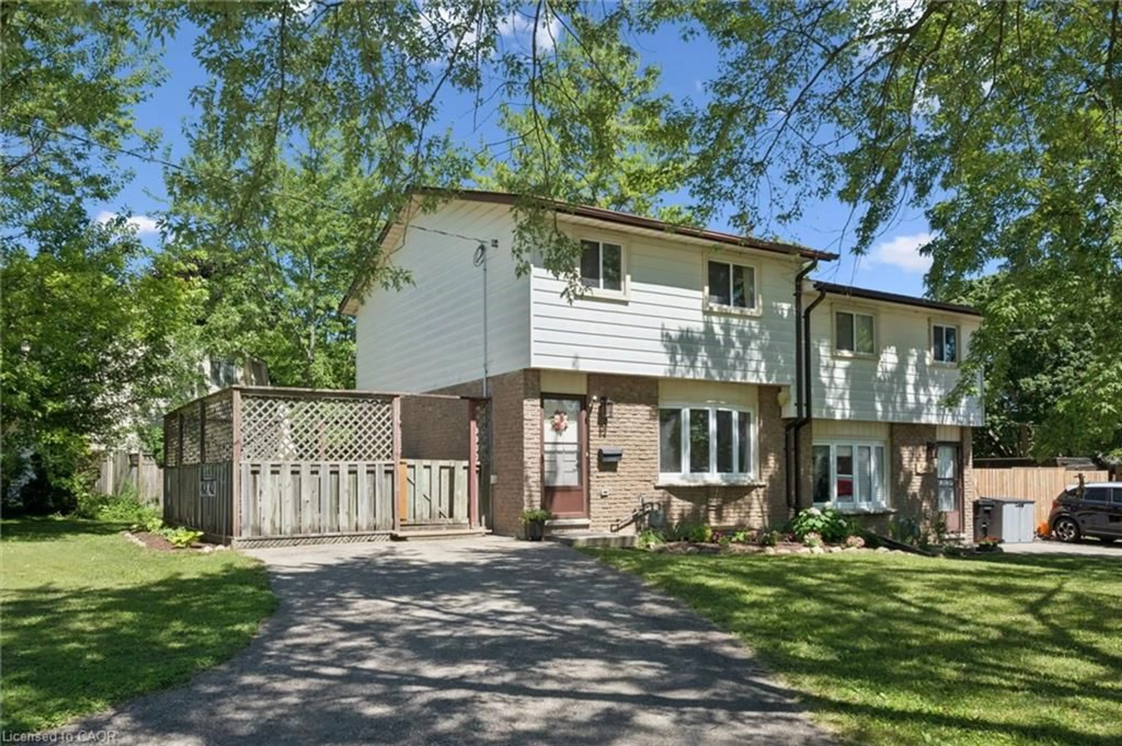 Home with brick exterior material, street for 54 Ellis Cres #A, Waterloo Ontario N2J 4L2