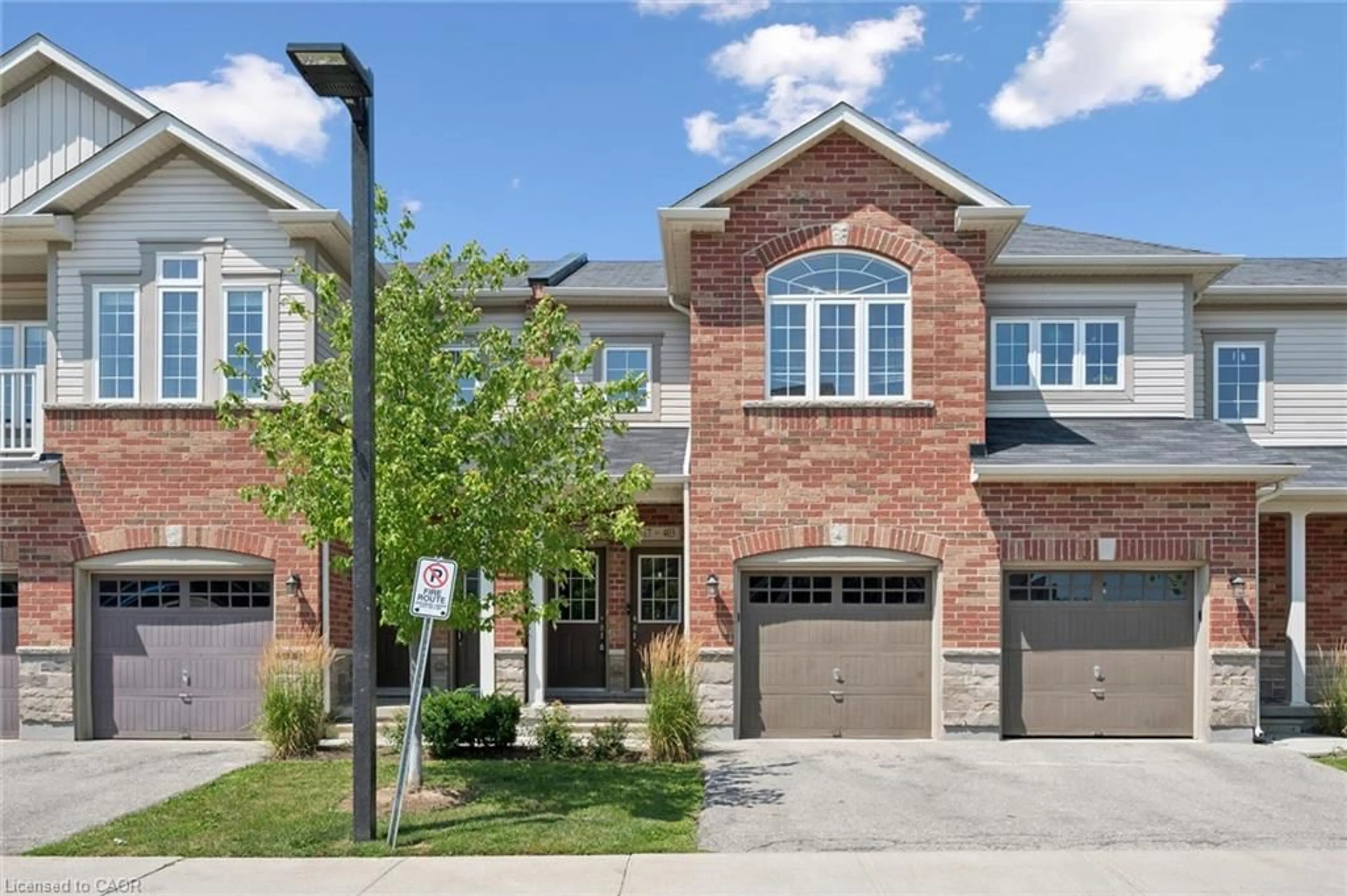 Home with brick exterior material, street for 403 Westwood Dr #16, Kitchener Ontario N2M 0B5