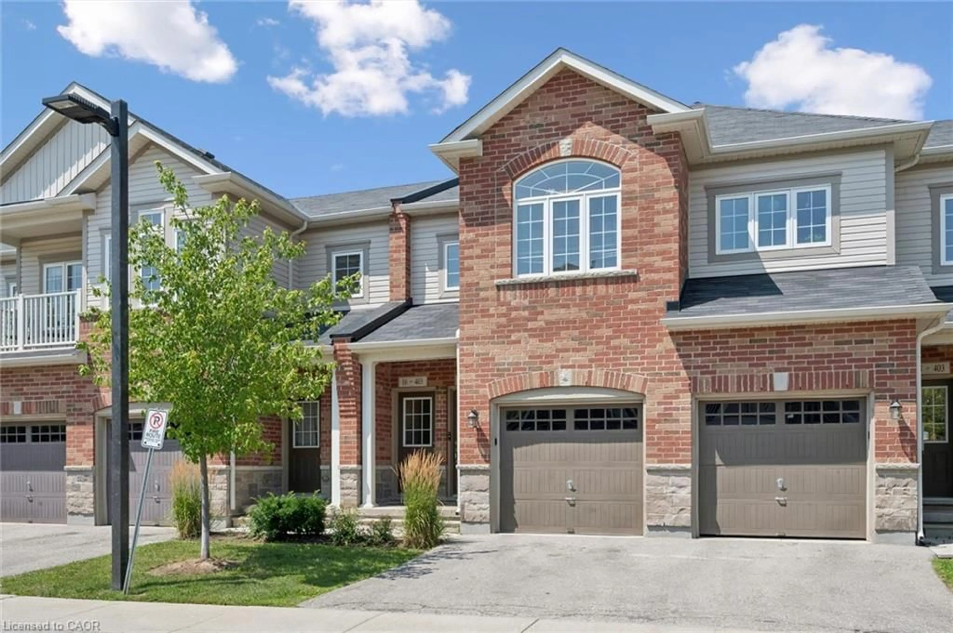 Home with brick exterior material, street for 403 Westwood Dr #16, Kitchener Ontario N2M 0B5