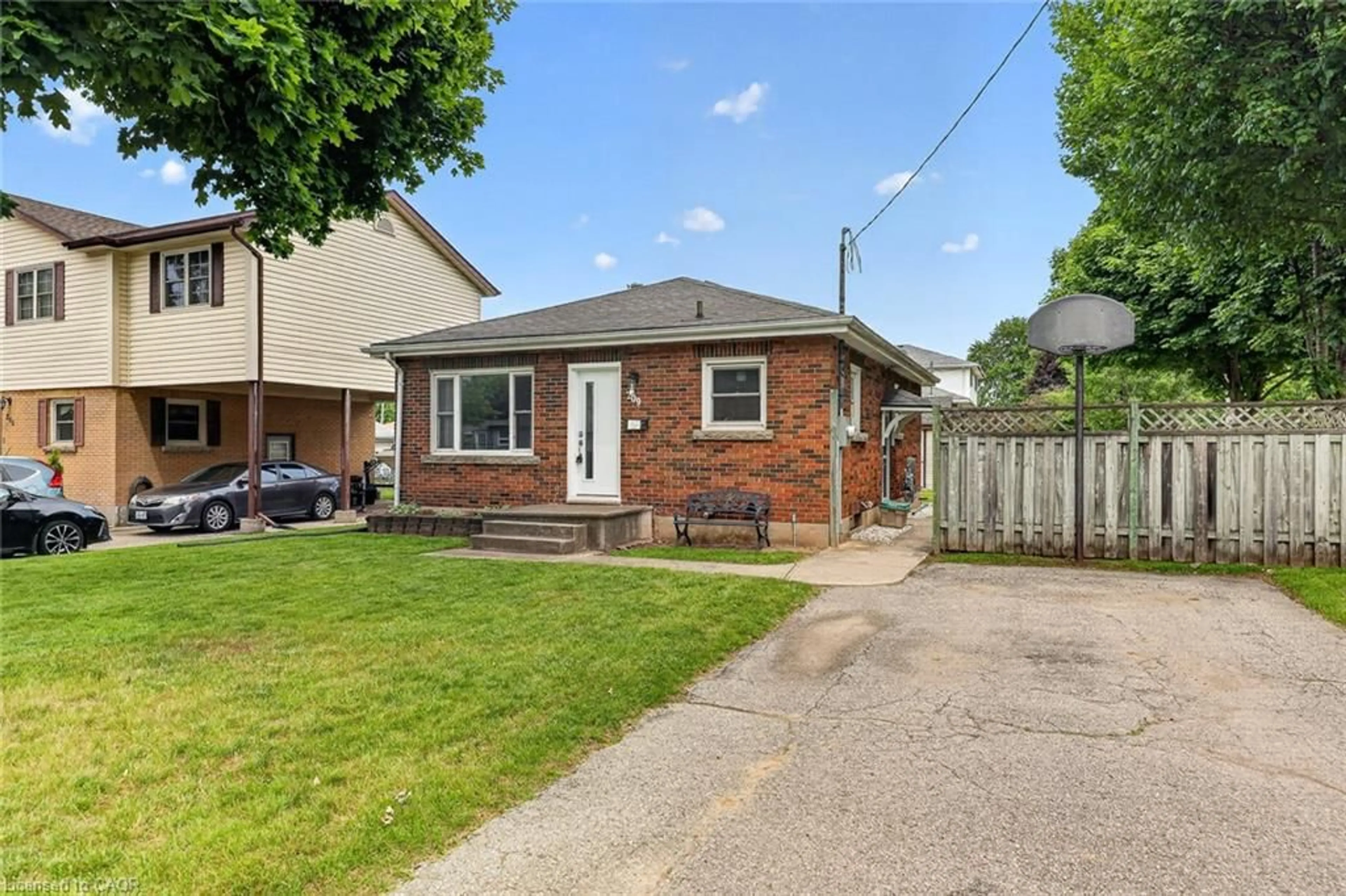 Home with brick exterior material, street for 209 Butler St, Woodstock Ontario N4S 3A8