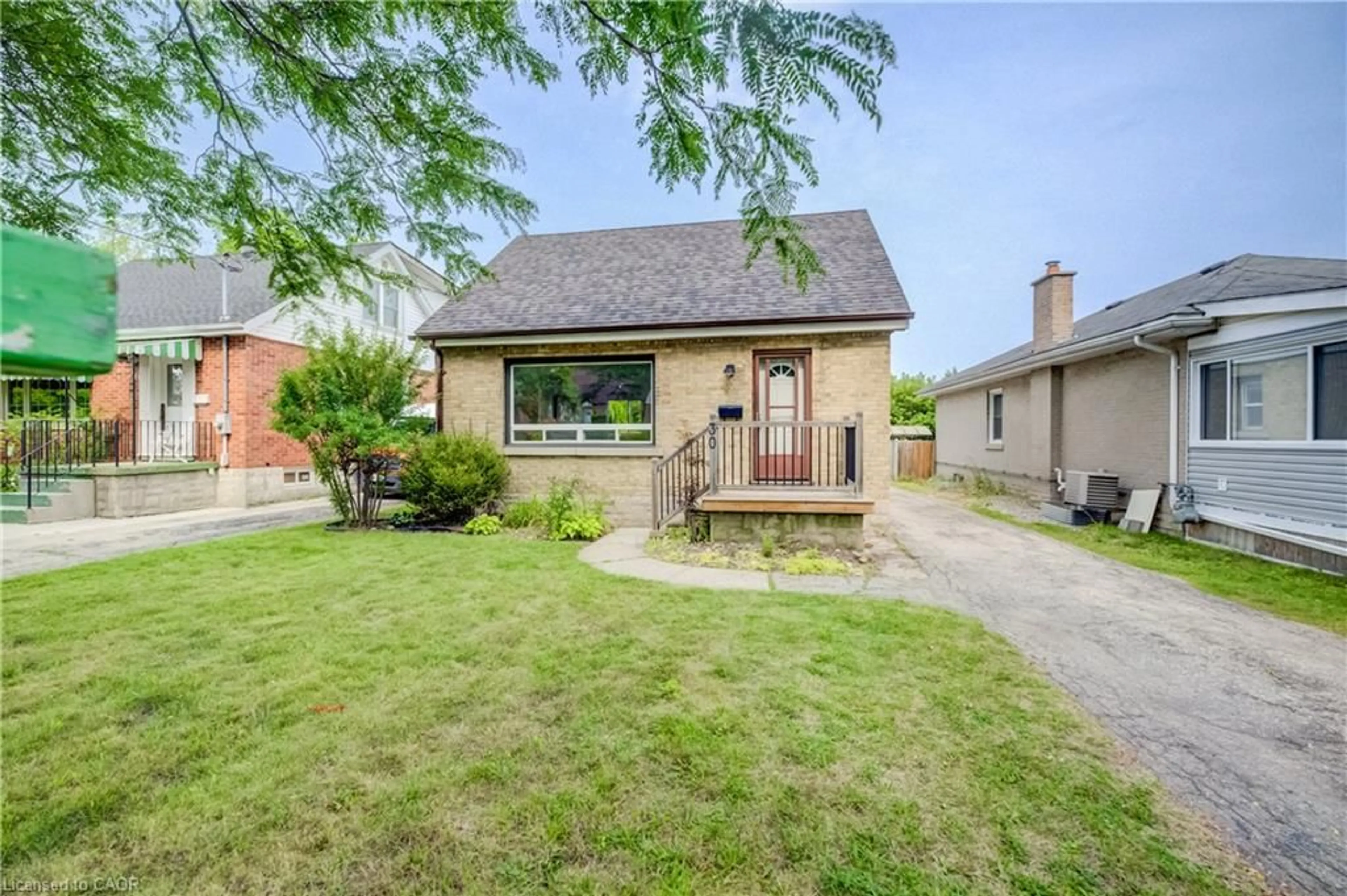 Home with brick exterior material, street for 30 Indiana St, Kitchener Ontario N2H 2A5
