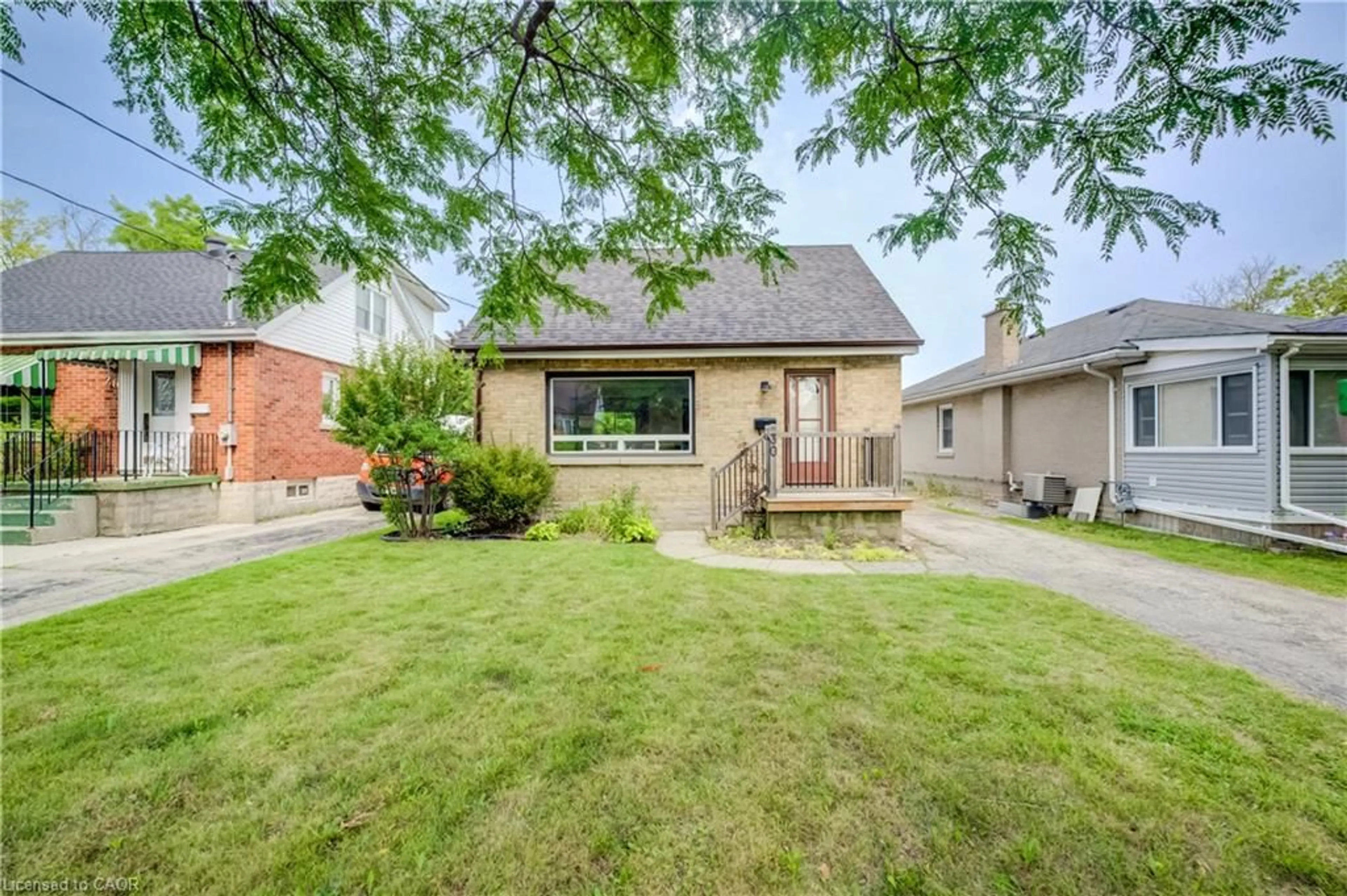Home with brick exterior material, street for 30 Indiana St, Kitchener Ontario N2H 2A5