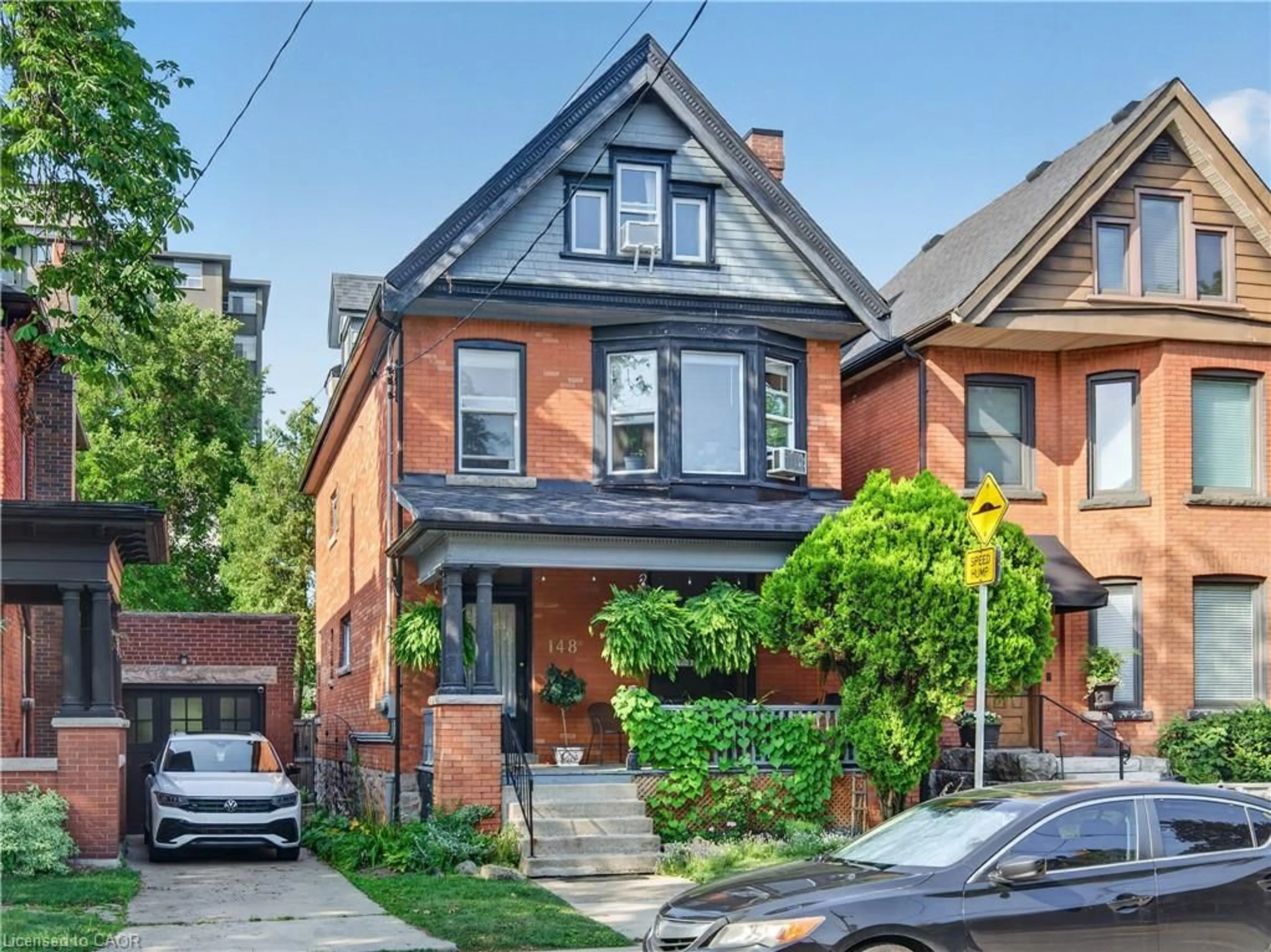 Home with brick exterior material, street for 148 Markland St, Hamilton Ontario L8P 2K5