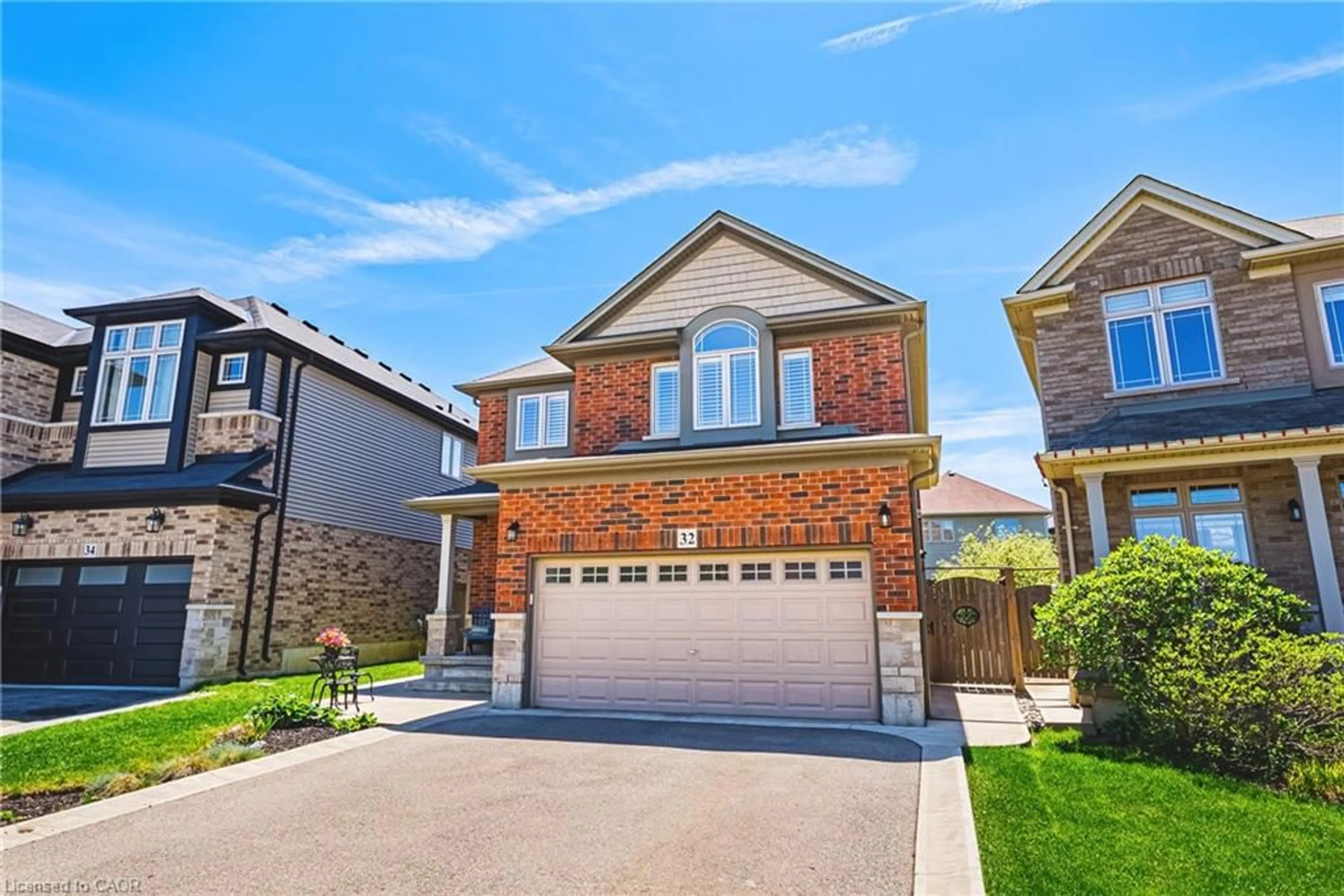 Home with brick exterior material, street for 32 Dulgaren St, Hamilton Ontario L8W 3Y8