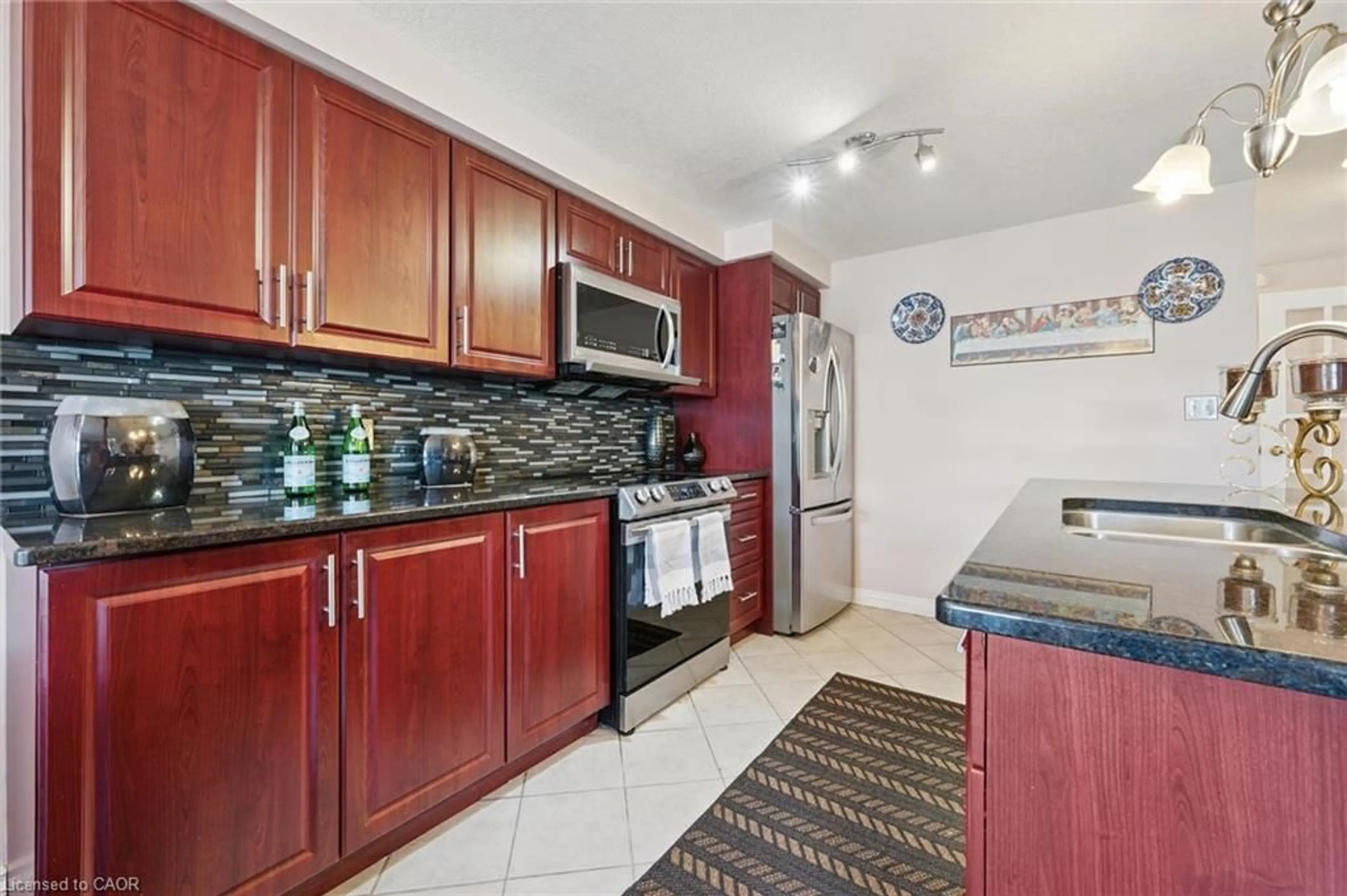 Standard kitchen, ceramic/tile floor for 86 Bridlewreath St, Kitchener Ontario N2E 3V6