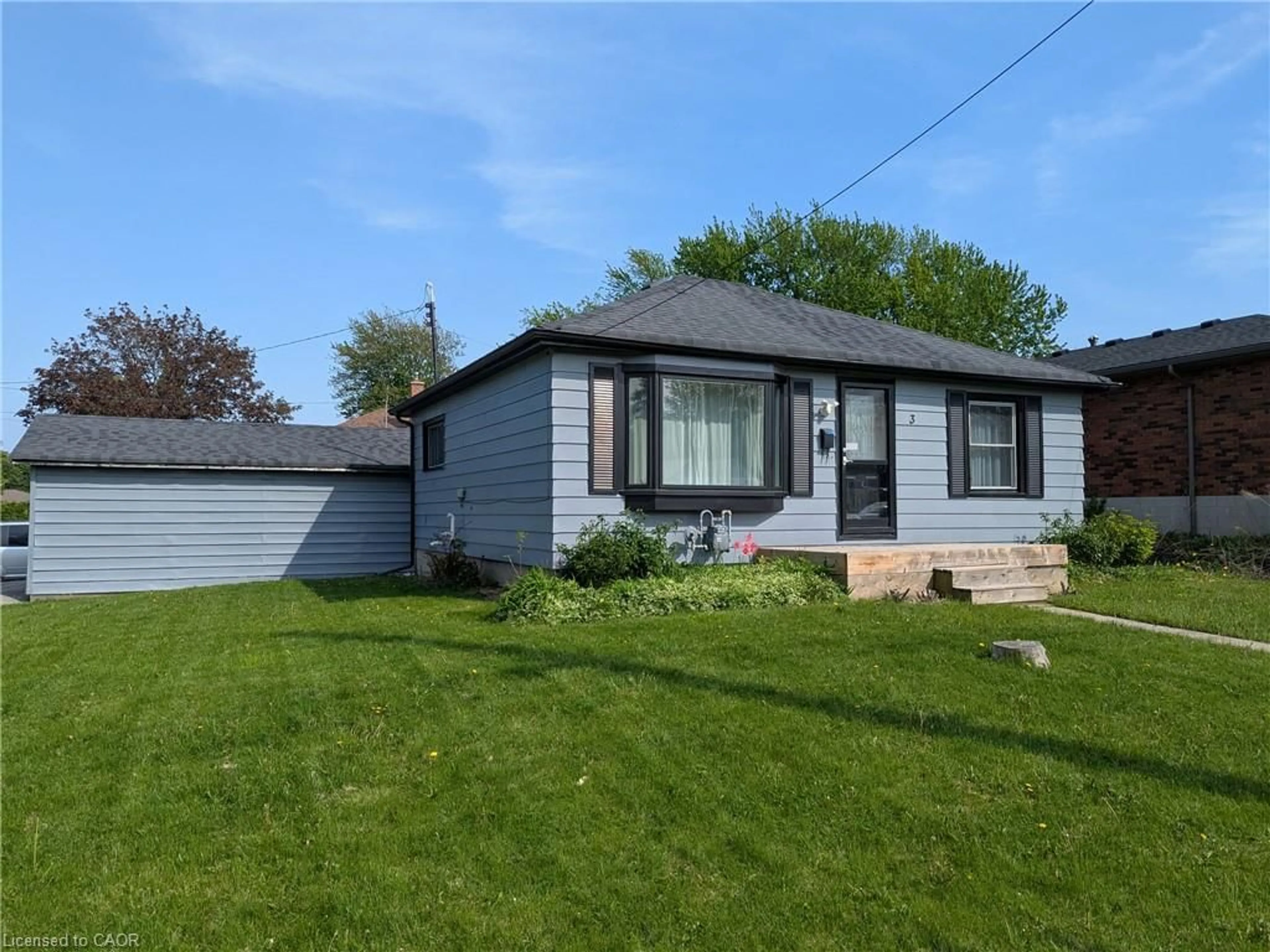 Home with vinyl exterior material, street for 3 Maitland Ave, Hamilton Ontario L9A 3J4