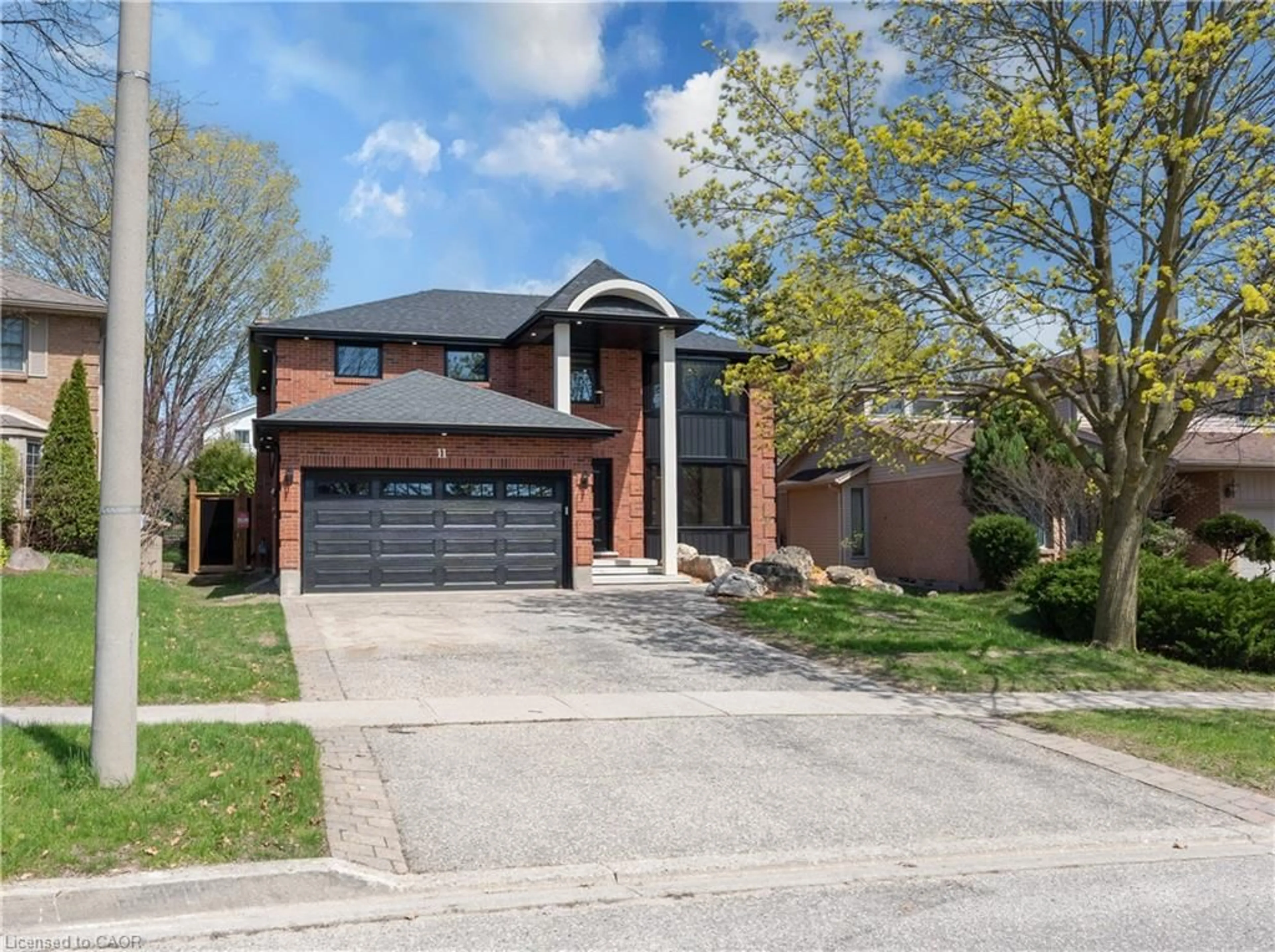 Home with brick exterior material, street for 11 Bridlewood Dr, Guelph Ontario N1G 4A5