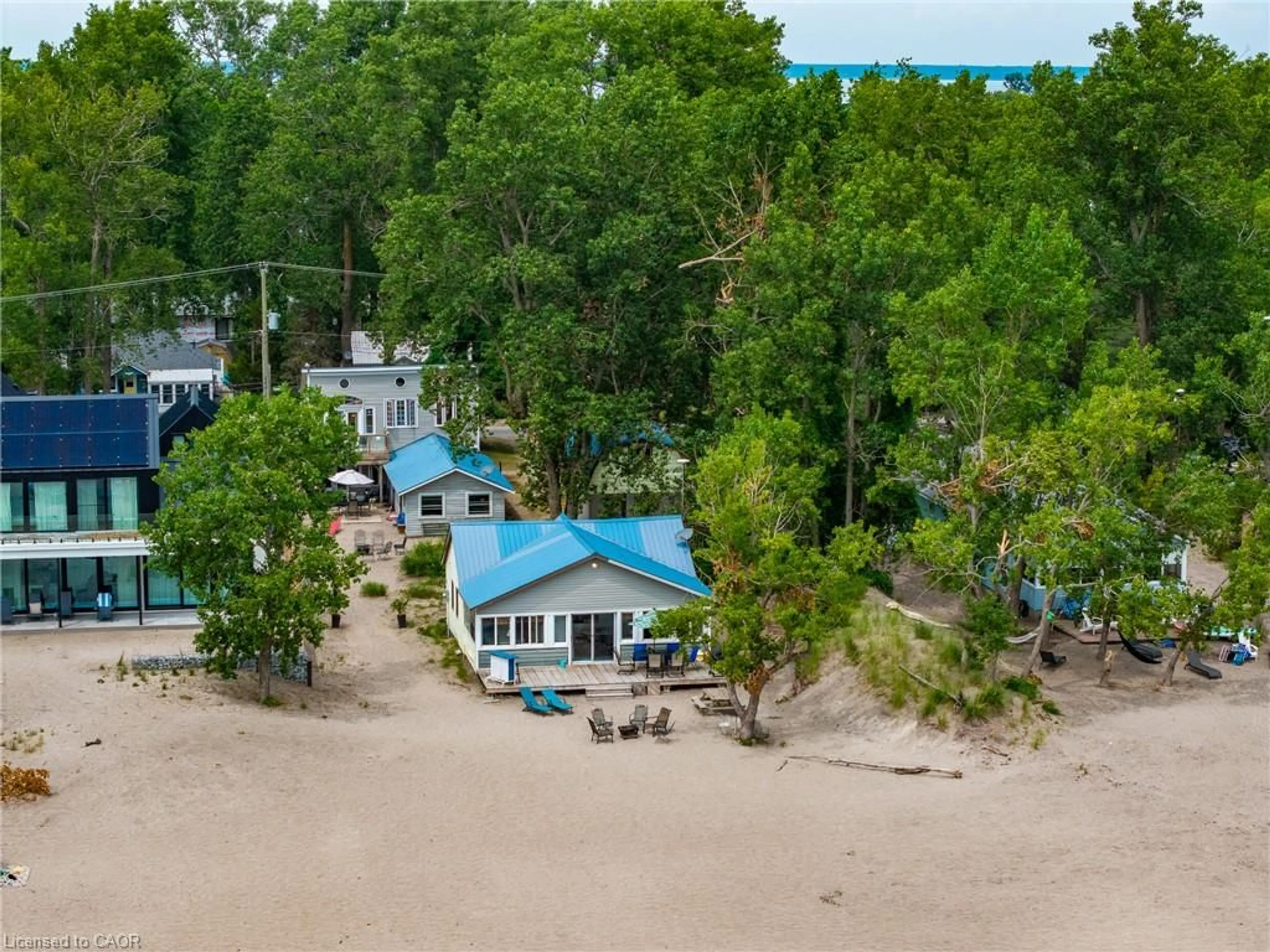 A pic from outside/outdoor area/front of a property/back of a property/a pic from drone, water/lake/river/ocean view for 5 Beach Ave, Long Point Ontario N0E 1M0
