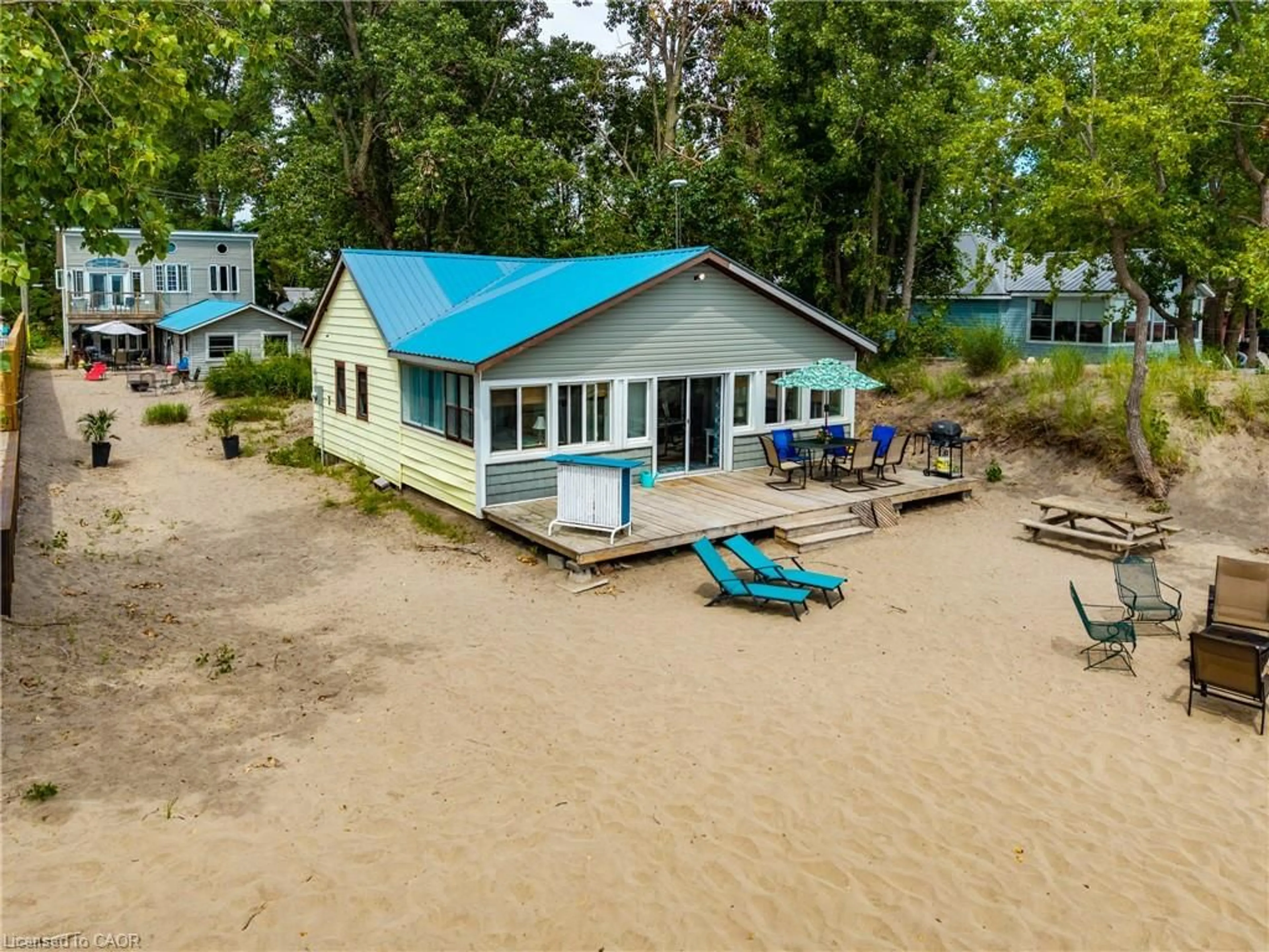 A pic from outside/outdoor area/front of a property/back of a property/a pic from drone, water/lake/river/ocean view for 5 Beach Ave, Long Point Ontario N0E 1M0