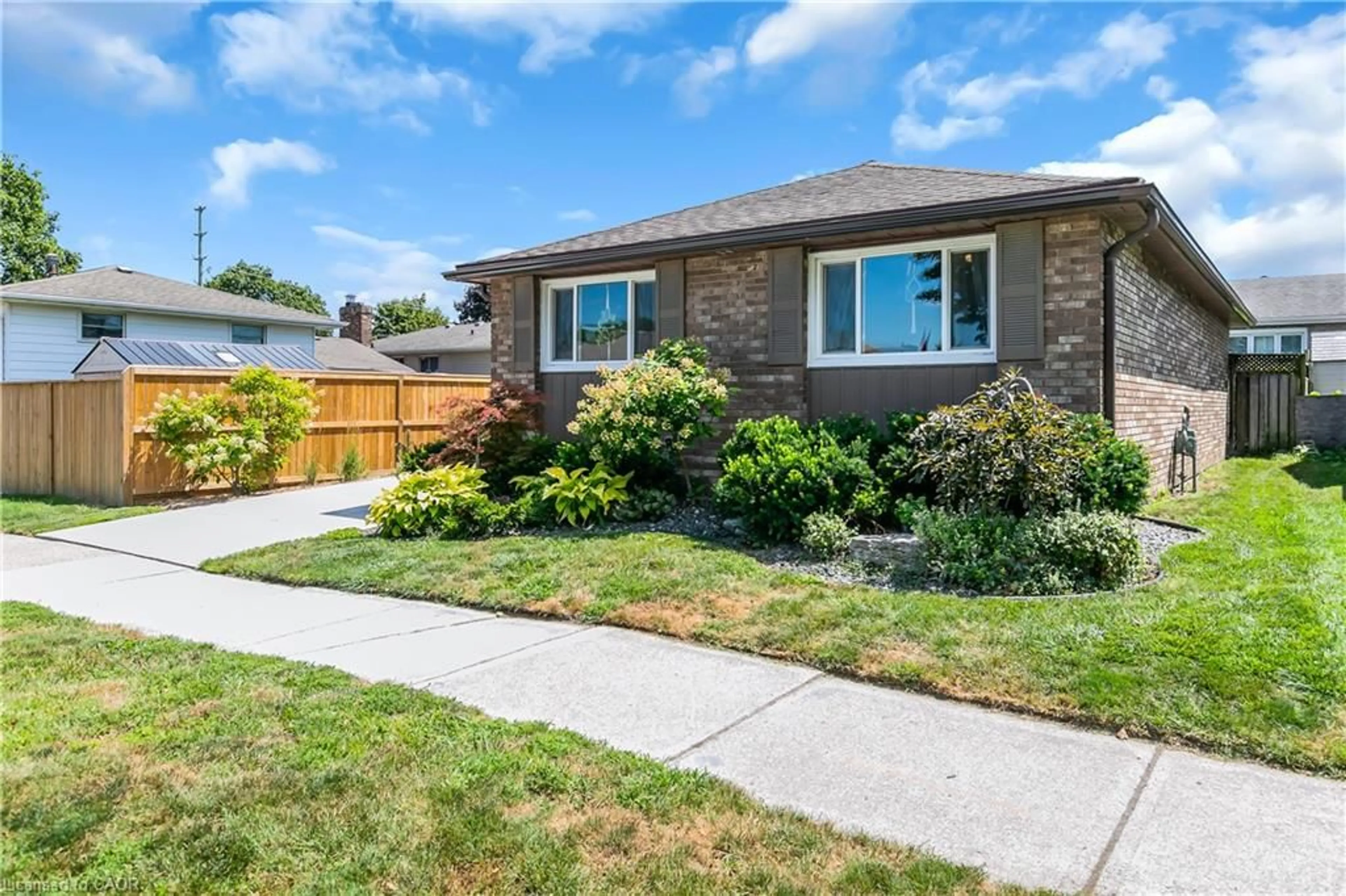 Home with brick exterior material, street for 12 Earl Dr, Chatham Ontario N7M 5Z2