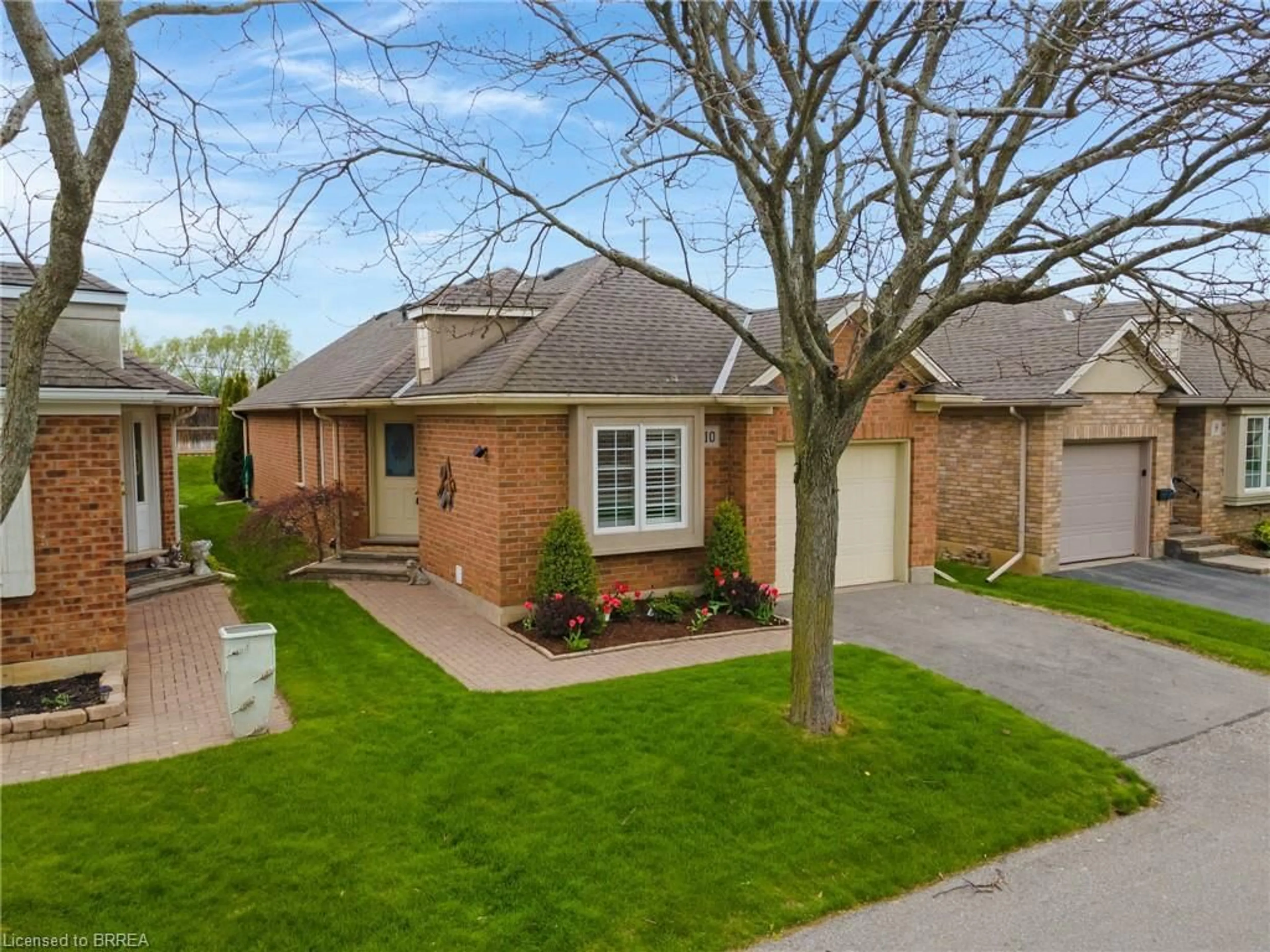Home with brick exterior material, street for 422 Powerline Rd #10, Brantford Ontario N3R 8A1
