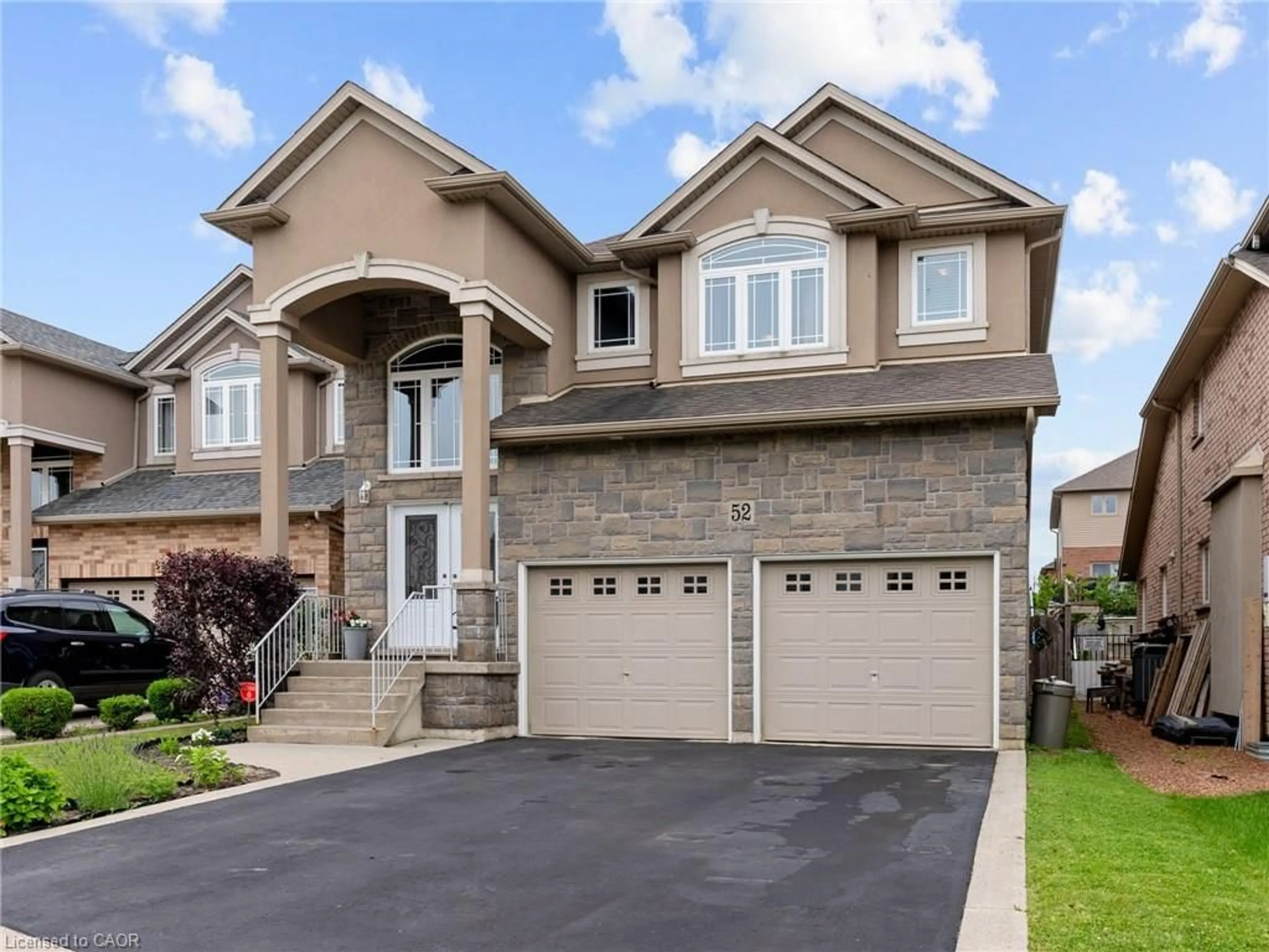 Home with brick exterior material, street for 52 Arrowhead Dr, Hamilton Ontario L8W 3X2