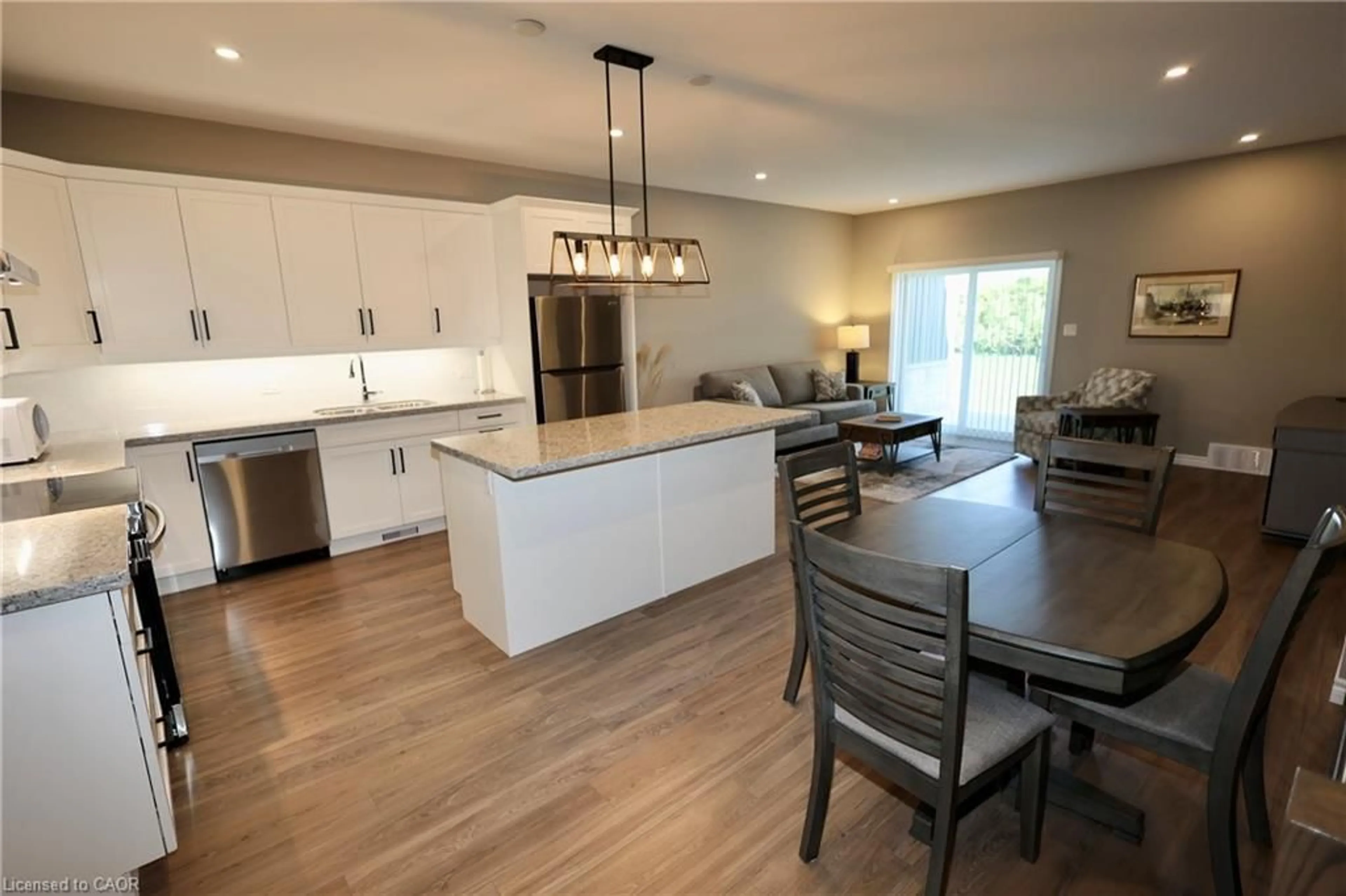Open concept kitchen, wood/laminate floor for 9 Silver Creek Rd, Seaforth Ontario N0K 1W0