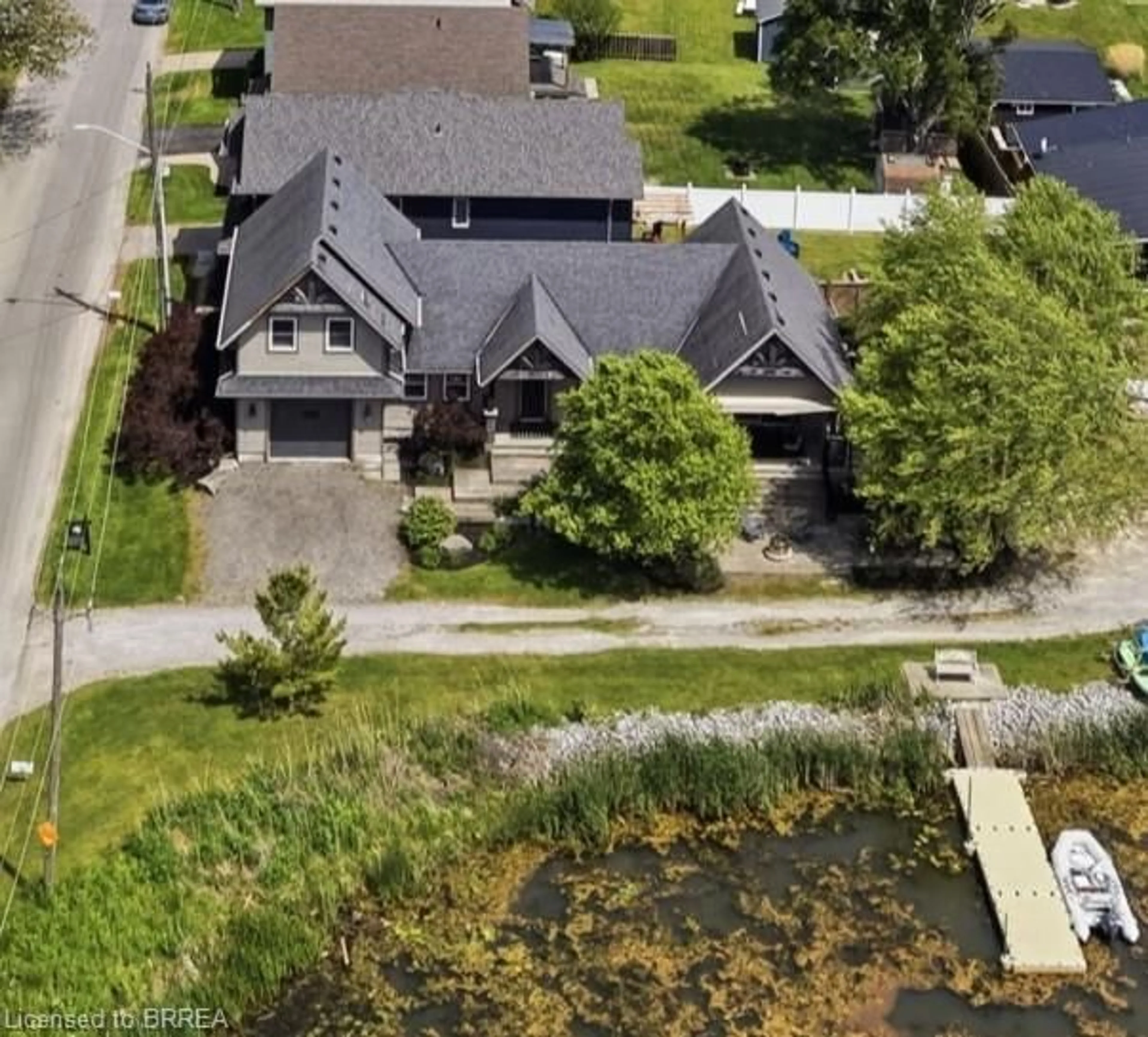 A pic from outside/outdoor area/front of a property/back of a property/a pic from drone, water/lake/river/ocean view for 10 Reserve St, Turkey Point Ontario N0E 1T0