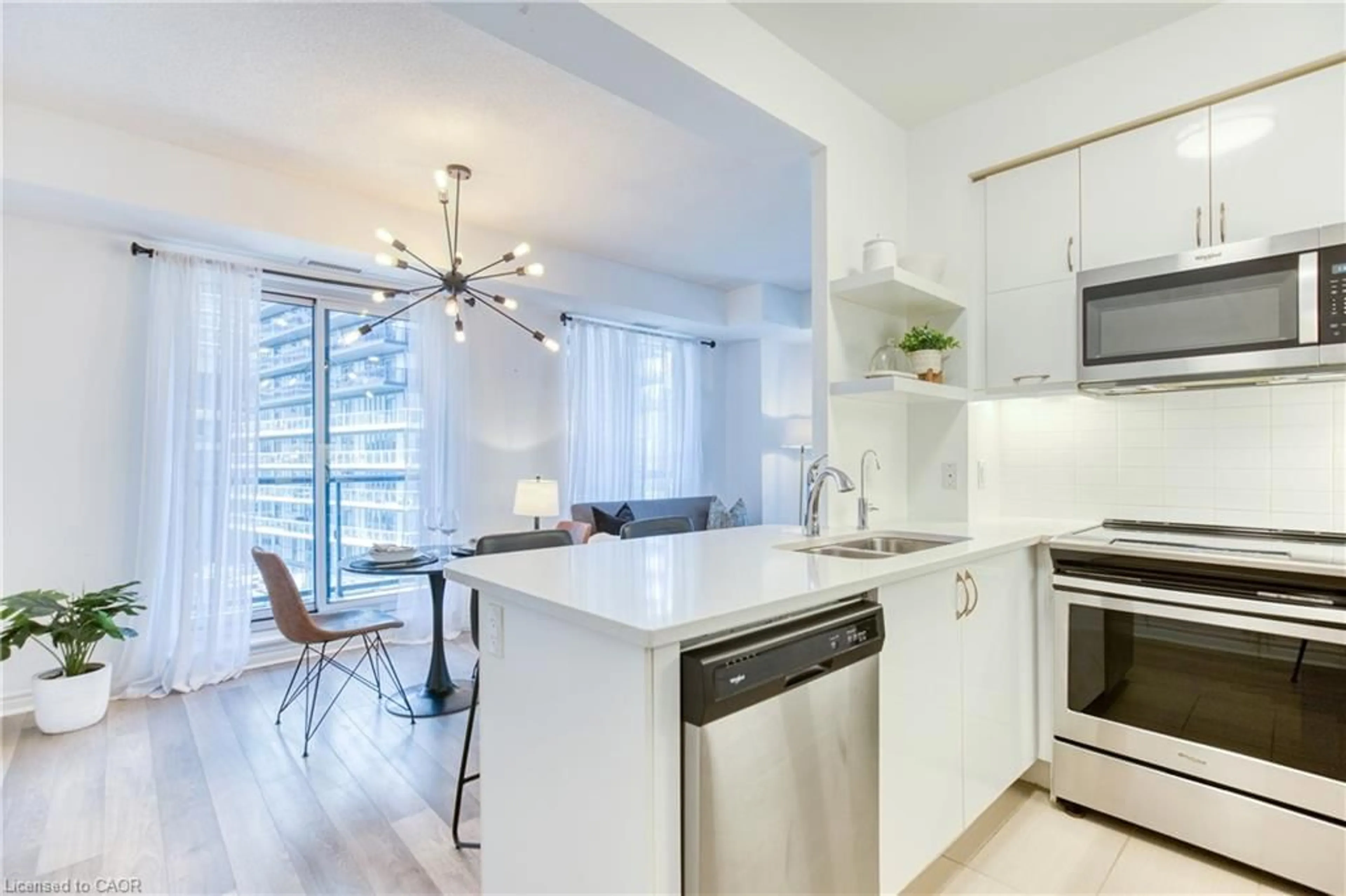 Open concept kitchen, unknown for 39 Annie Craig Dr #905, Toronto Ontario M8V 0H1