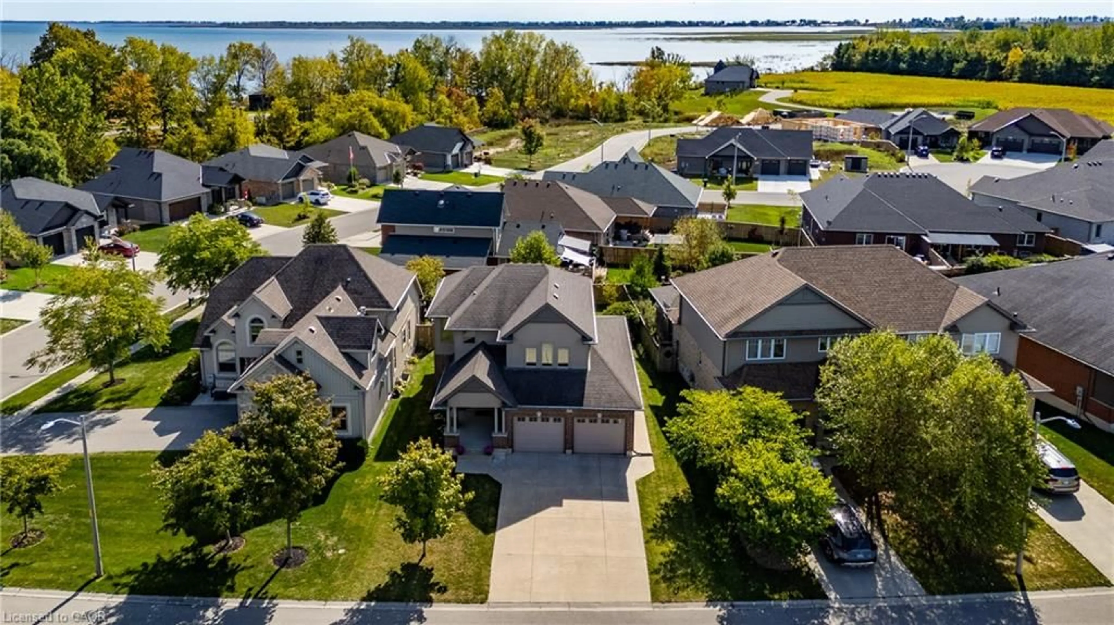 A pic from outside/outdoor area/front of a property/back of a property/a pic from drone, water/lake/river/ocean view for 5 Wood Duck Way, Port Rowan Ontario N0E 1M0