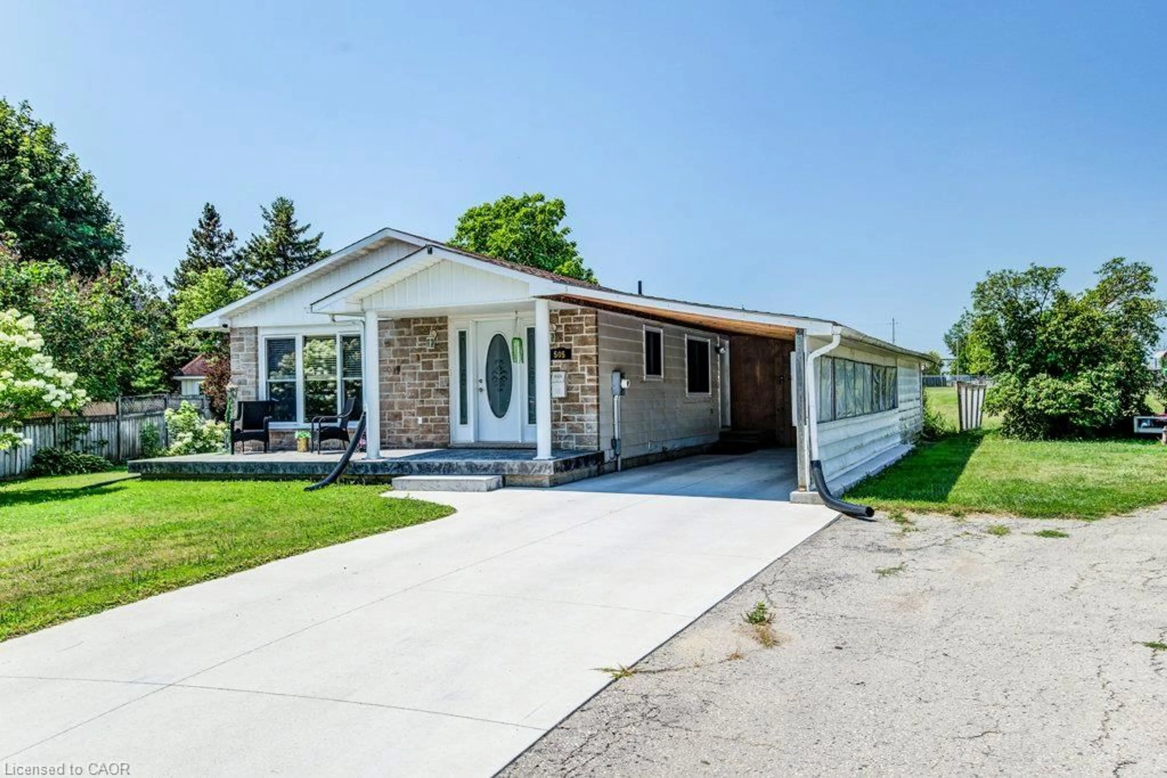 Home with vinyl exterior material, street for 505 Briarwood Ave, Listowel Ontario N4W 3P9