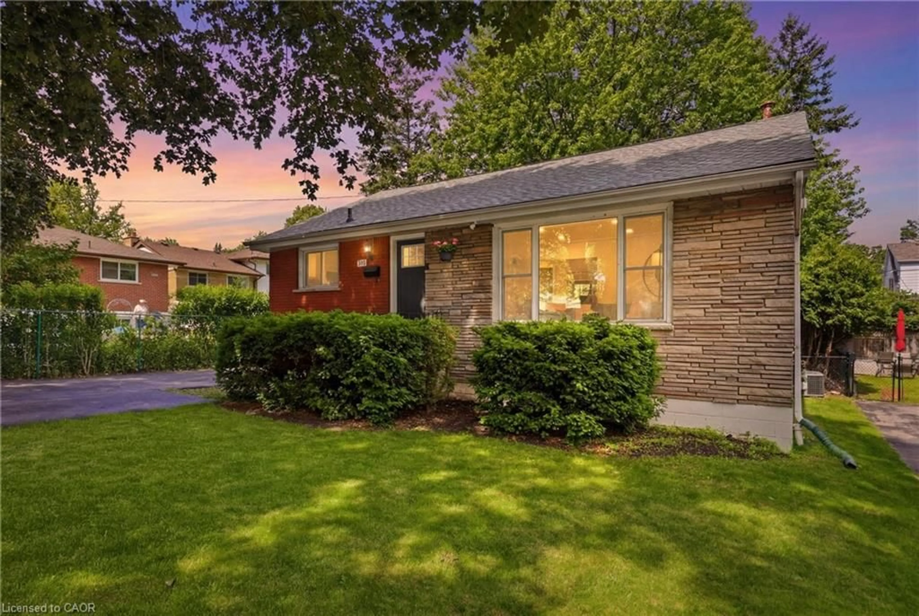 Home with brick exterior material, street for 312 Upper Paradise Rd, Hamilton Ontario L9C 5C4
