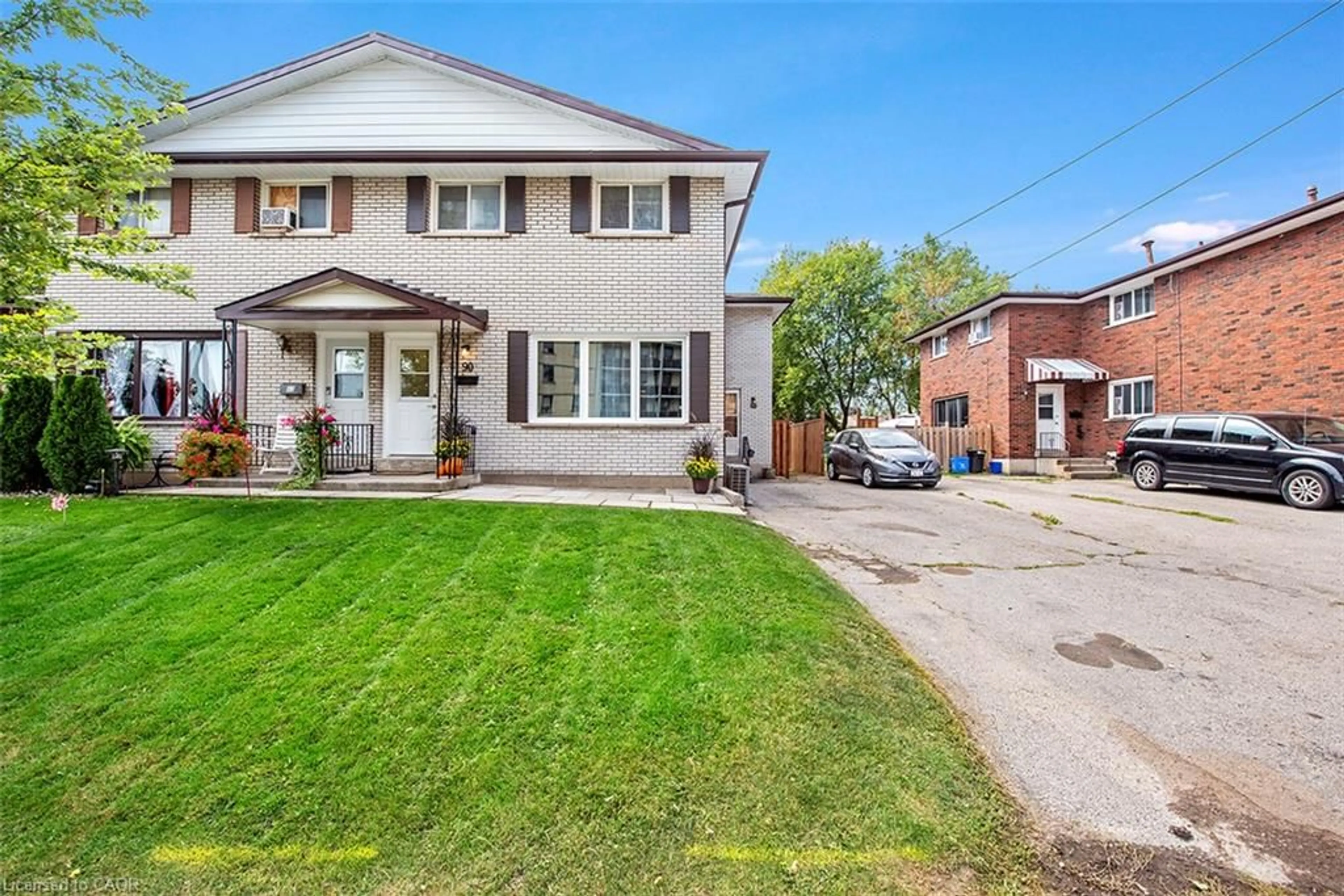 Home with brick exterior material, street for 80 & 82 Delawana Dr, Hamilton Ontario L8E 1G4