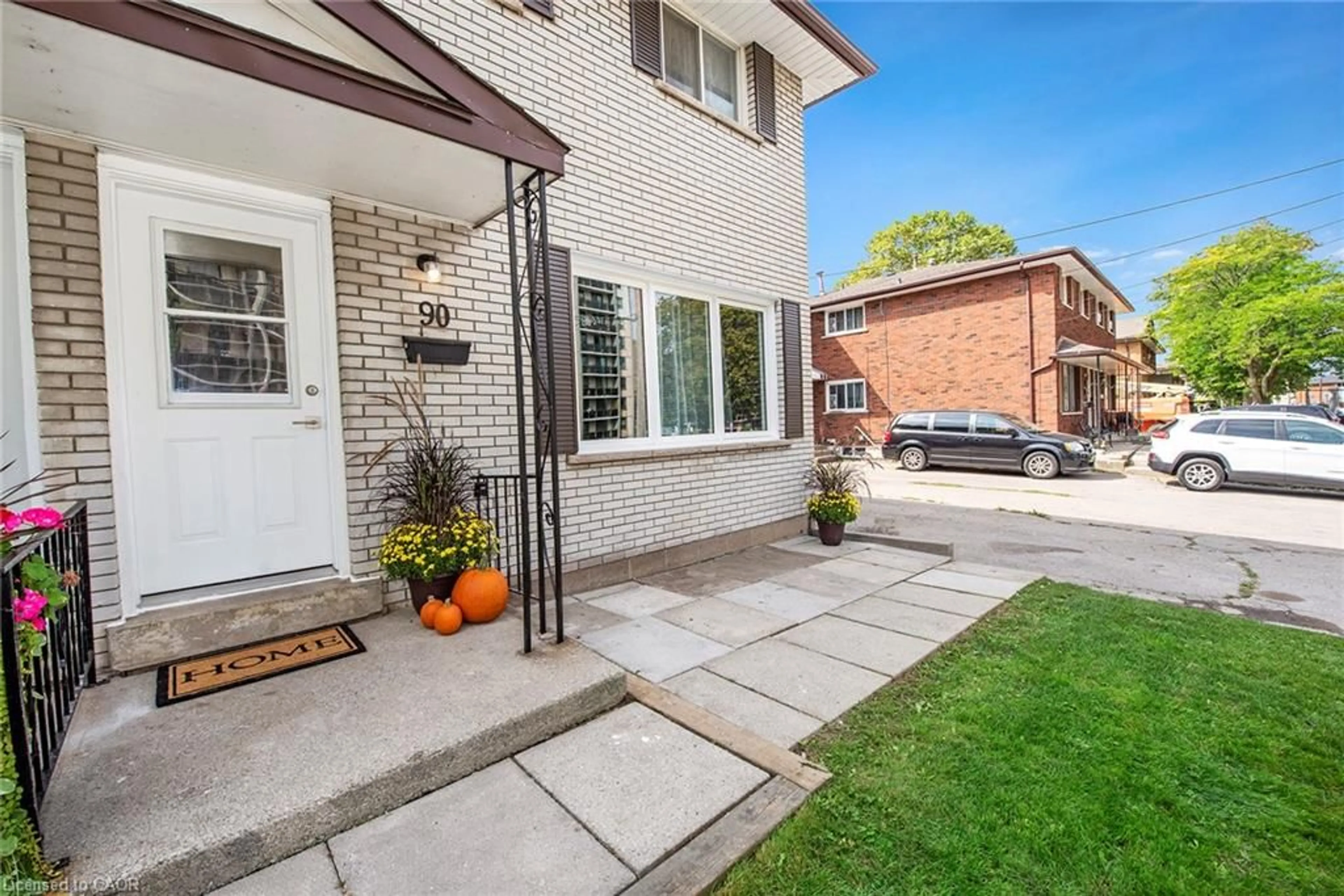 Home with brick exterior material, street for 80 & 82 Delawana Dr, Hamilton Ontario L8E 1G4