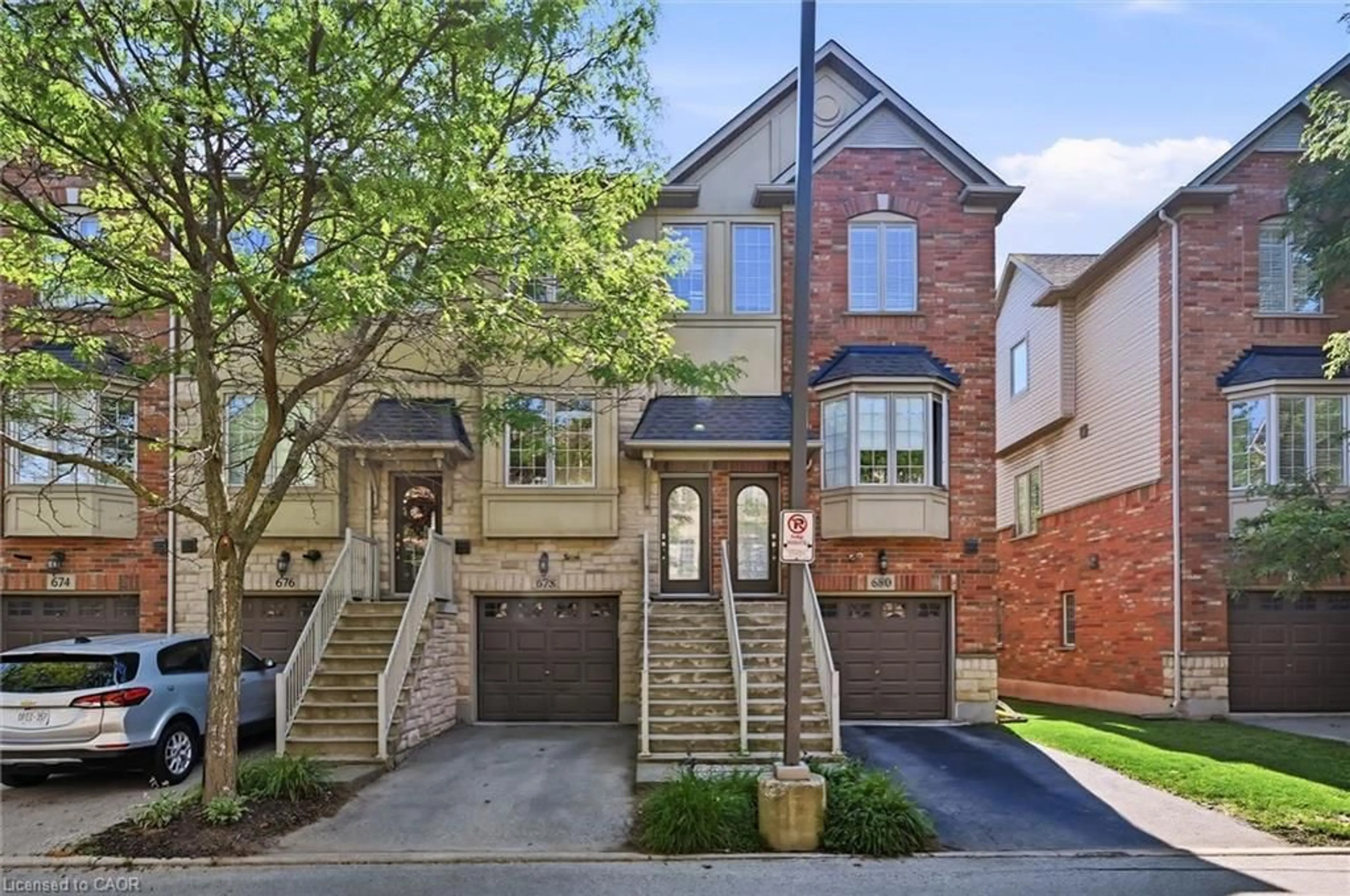 Home with brick exterior material, street for 678 Rowley Common, Burlington Ontario L7L 0A5