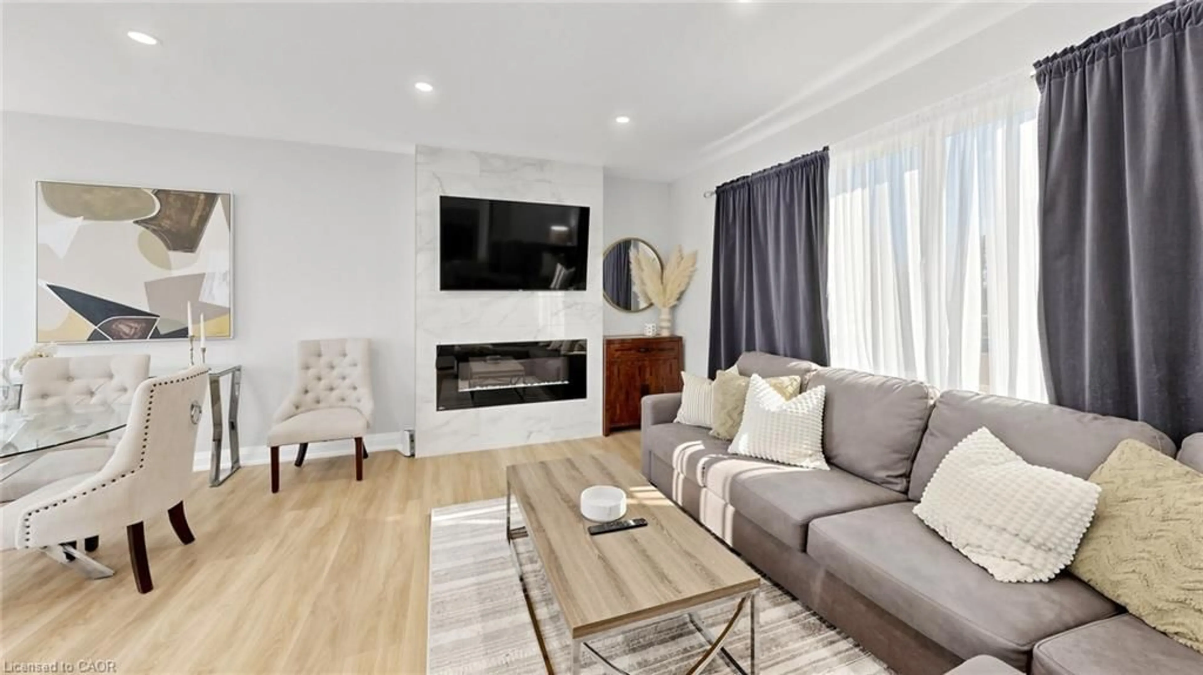 Living room with furniture, wood/laminate floor for 1486 Barker Ave, Burlington Ontario L7P 2R4